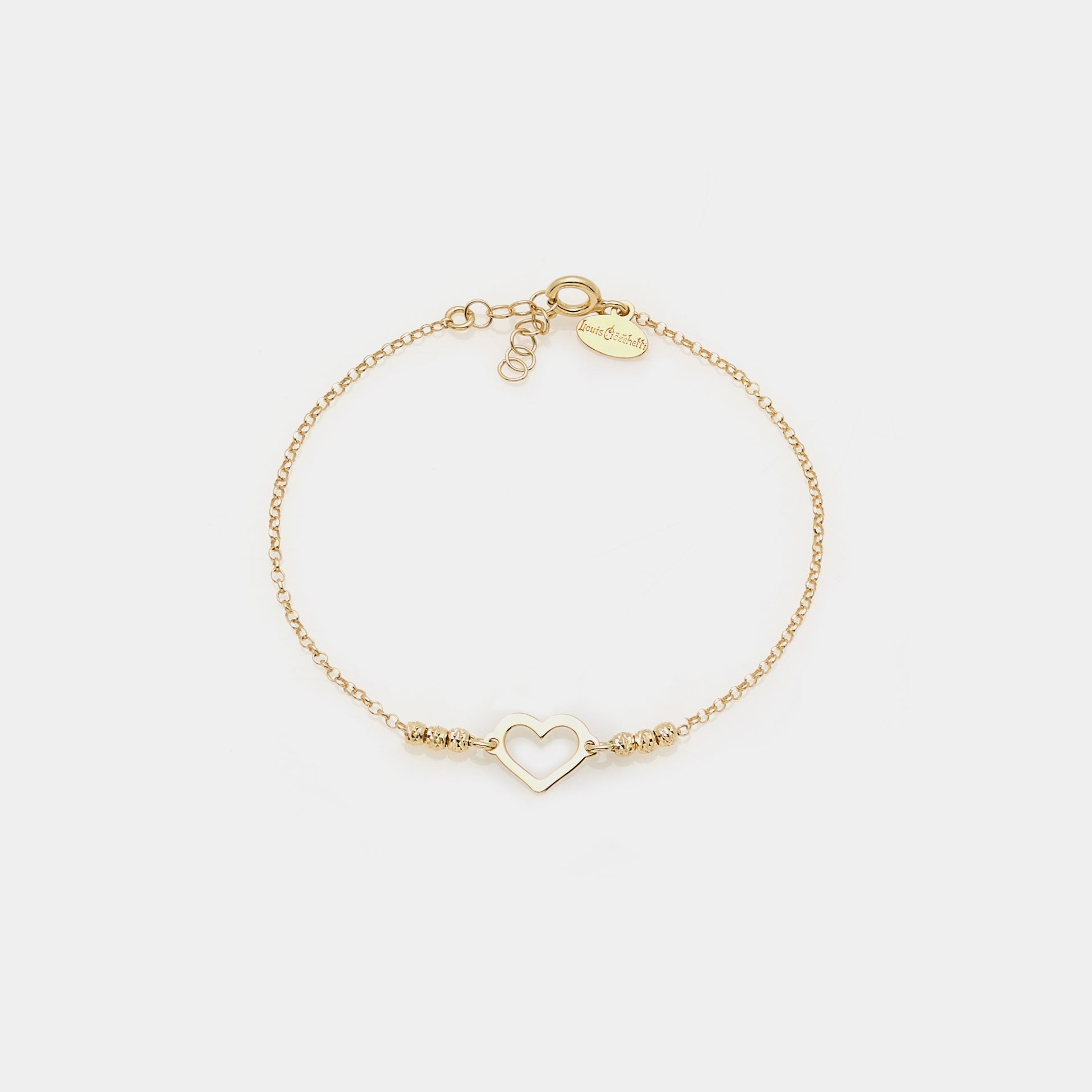 Gold-plated silver bracelet with faceted beads and central heart
