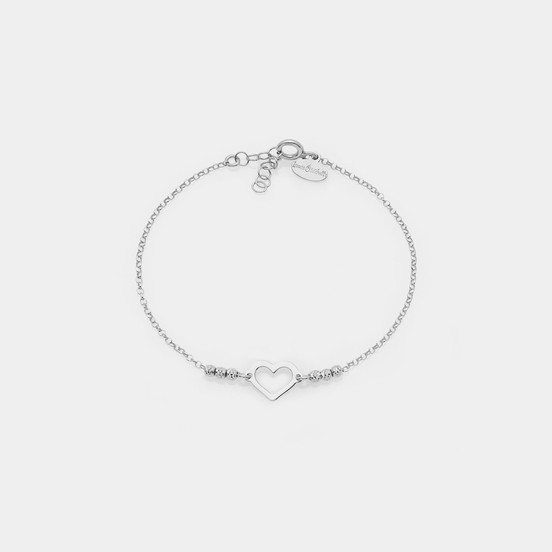 Rhodium-plated silver bracelet with faceted beads and central heart