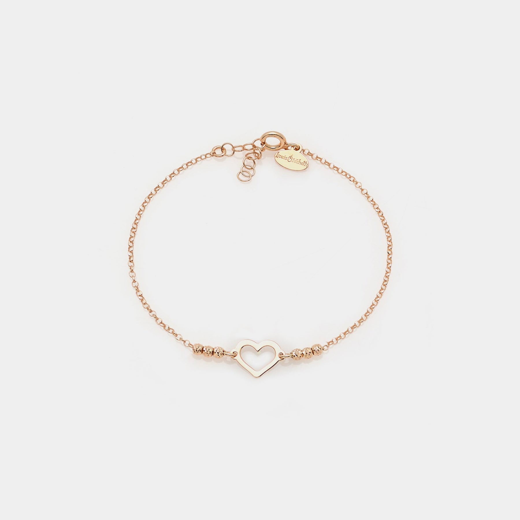 Rose gold plated silver bracelet with faceted spheres and central heart