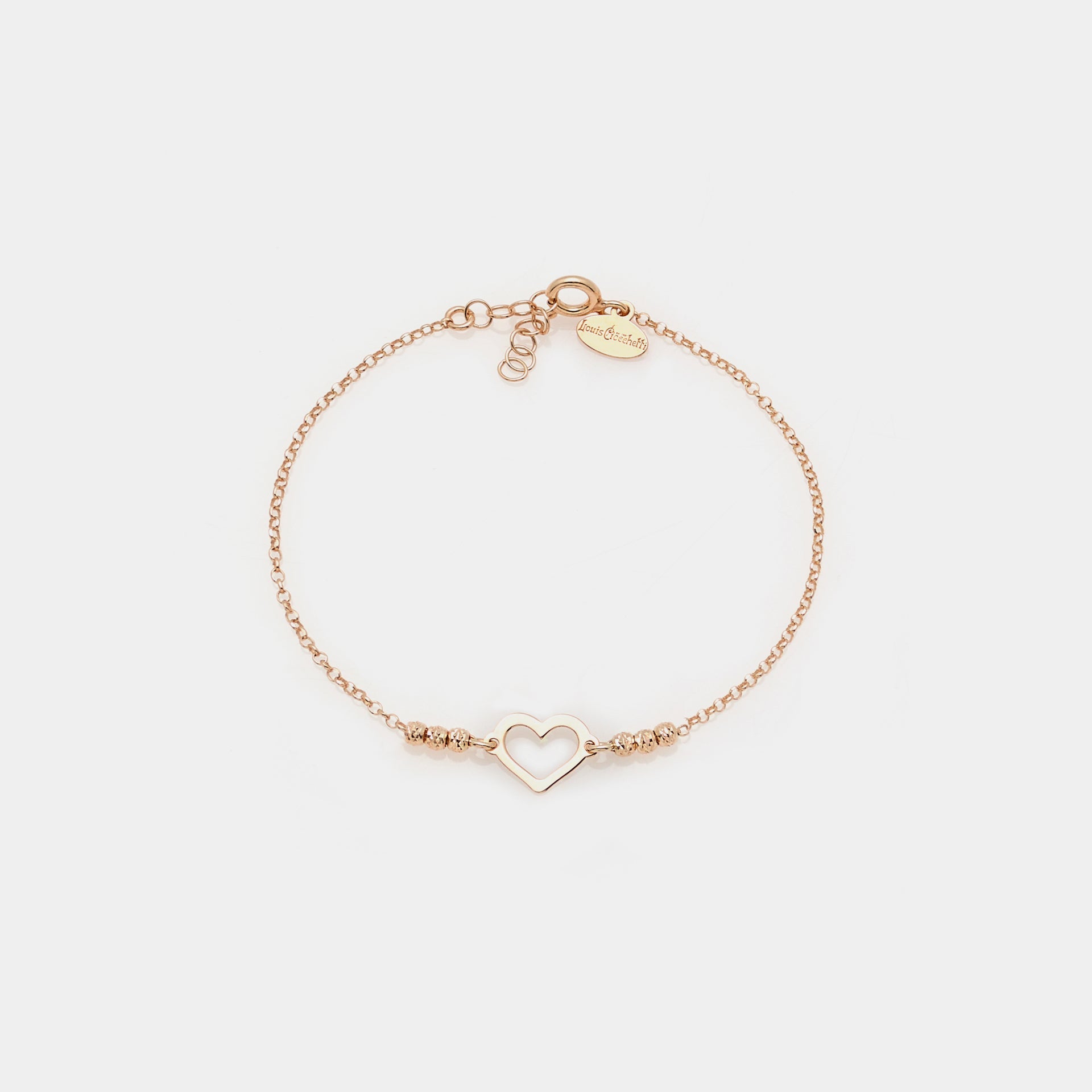 Rose gold plated silver bracelet with faceted spheres and central heart