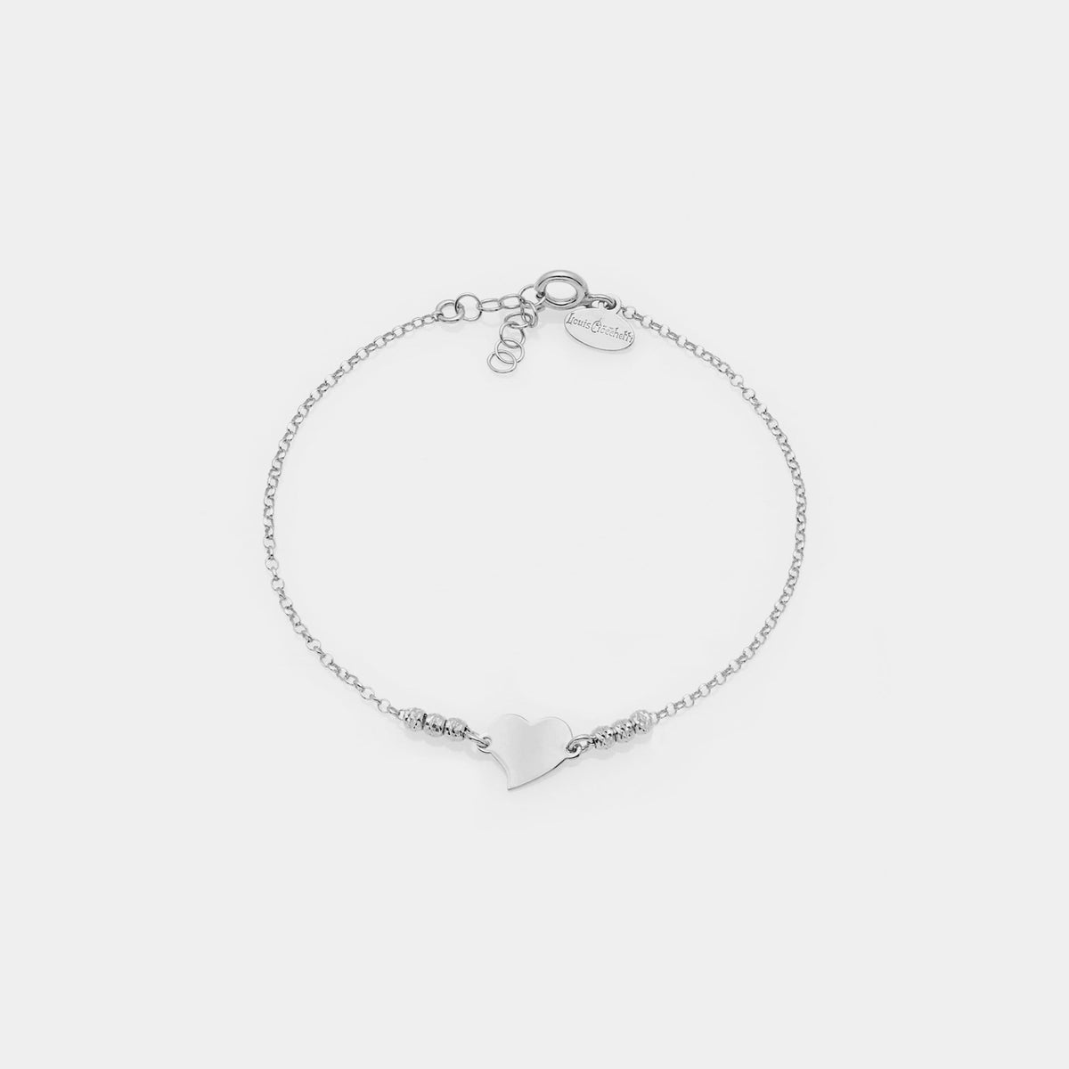 Pulsera de plata chapada en rodio con esferas facetadas y corazón central