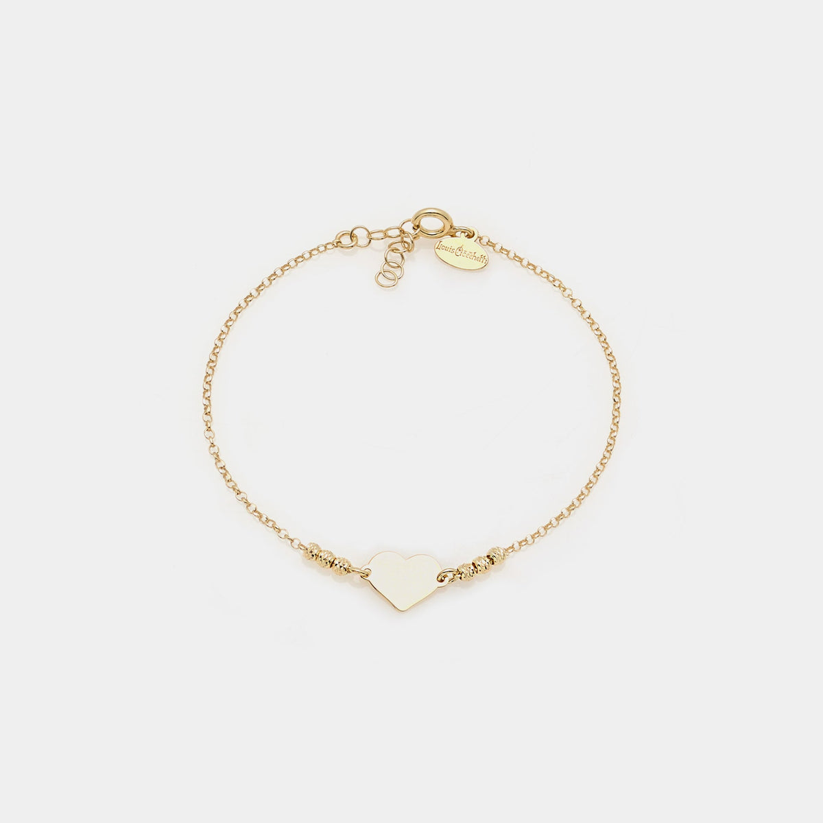 Gold-plated silver bracelet with faceted spheres and central heart