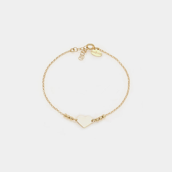 Gold-plated silver bracelet with faceted spheres and central heart