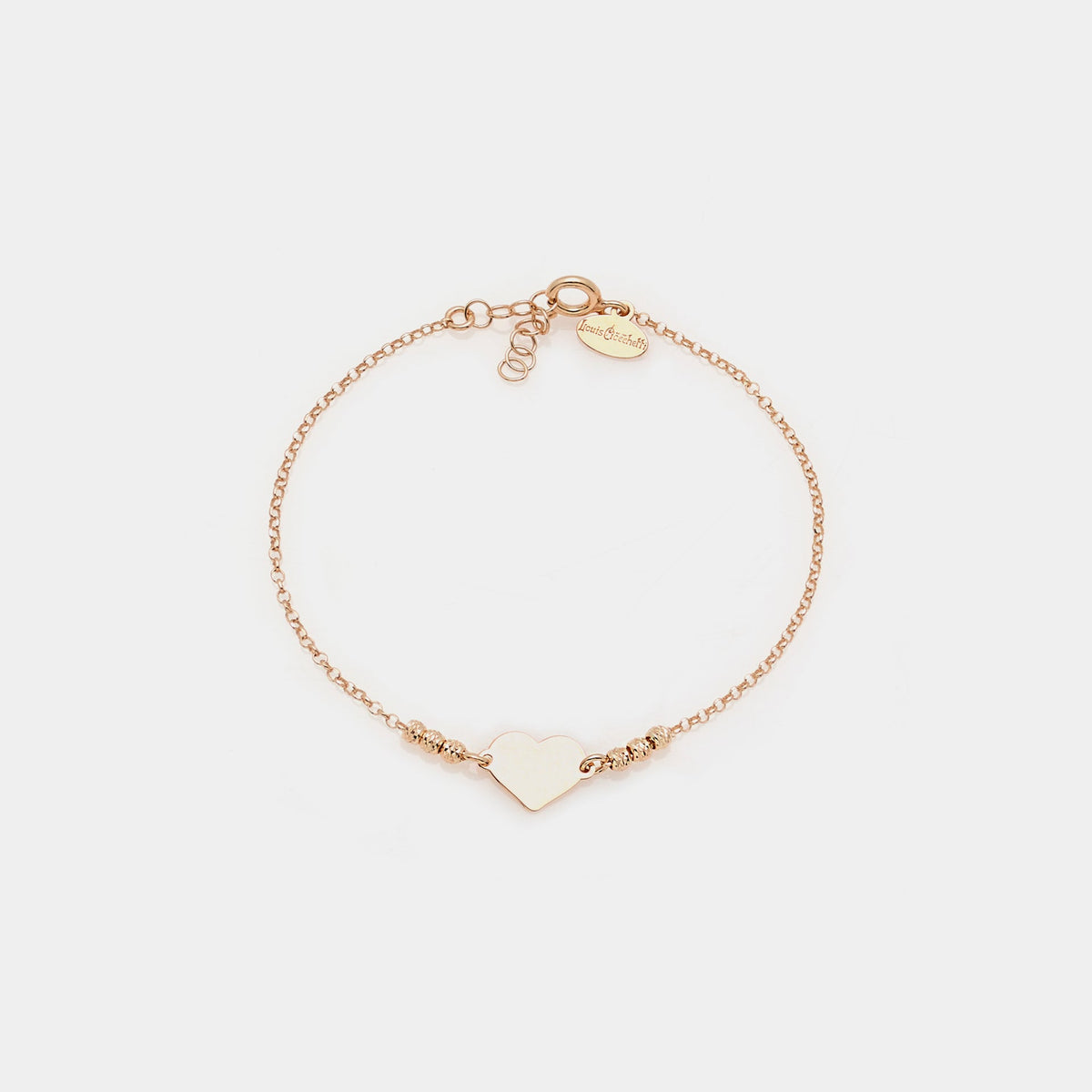 Rose gold plated silver bracelet with faceted spheres and central heart