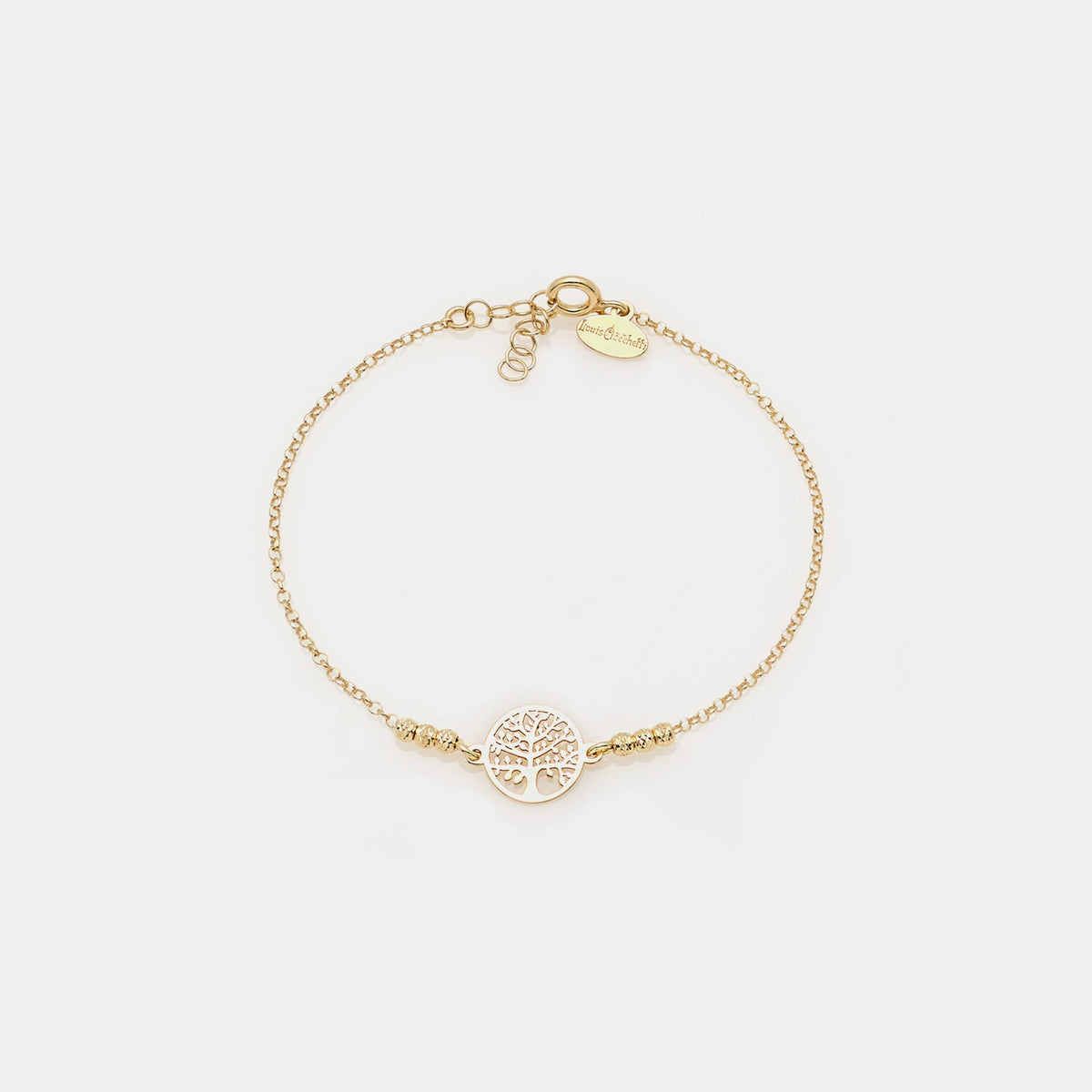 Gold-plated silver bracelet with faceted spheres and pierced round tree of life centerpiece