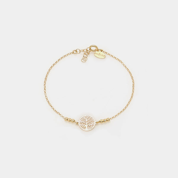 Gold-plated silver bracelet with faceted spheres and pierced round tree of life centerpiece