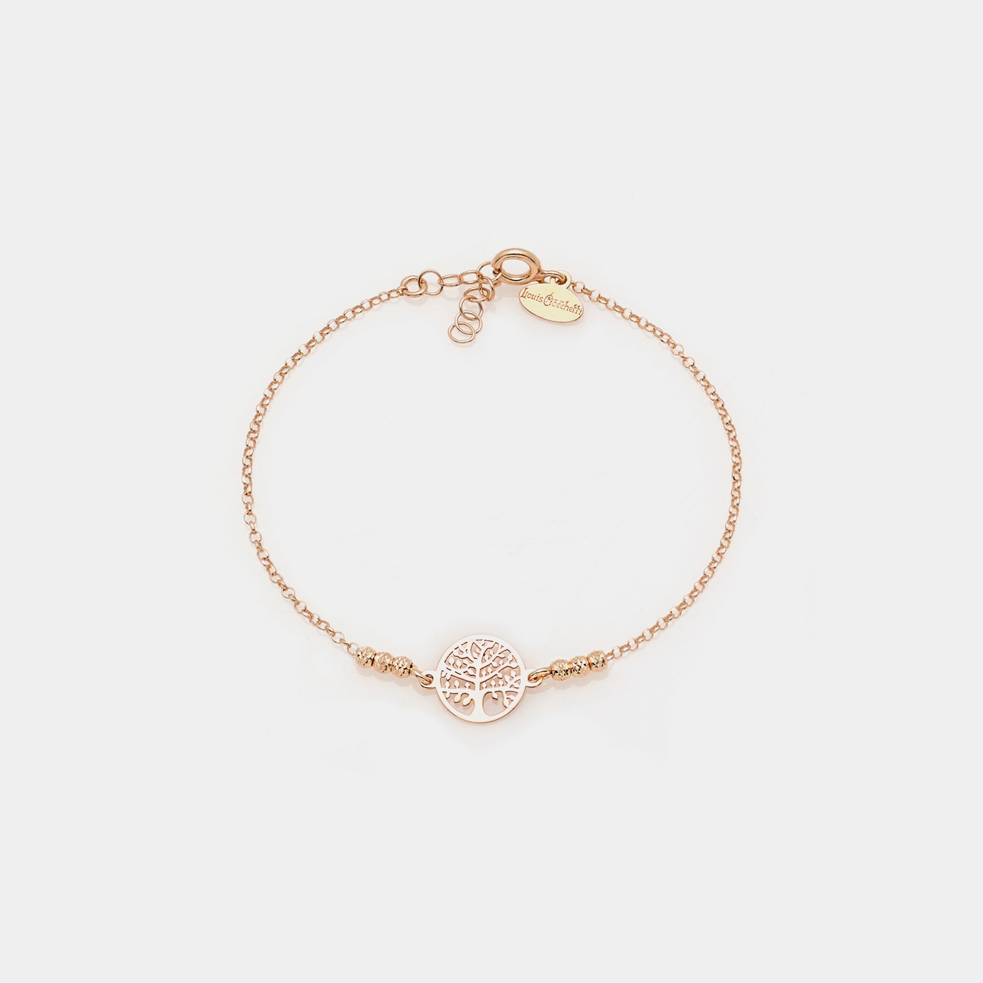 Rose gold plated silver bracelet with faceted spheres and central round cut-out tree of life