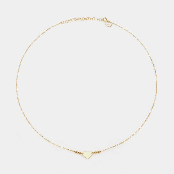 Gold-plated silver necklace with simple heart centerpiece and 3 faceted spheres on the sides
