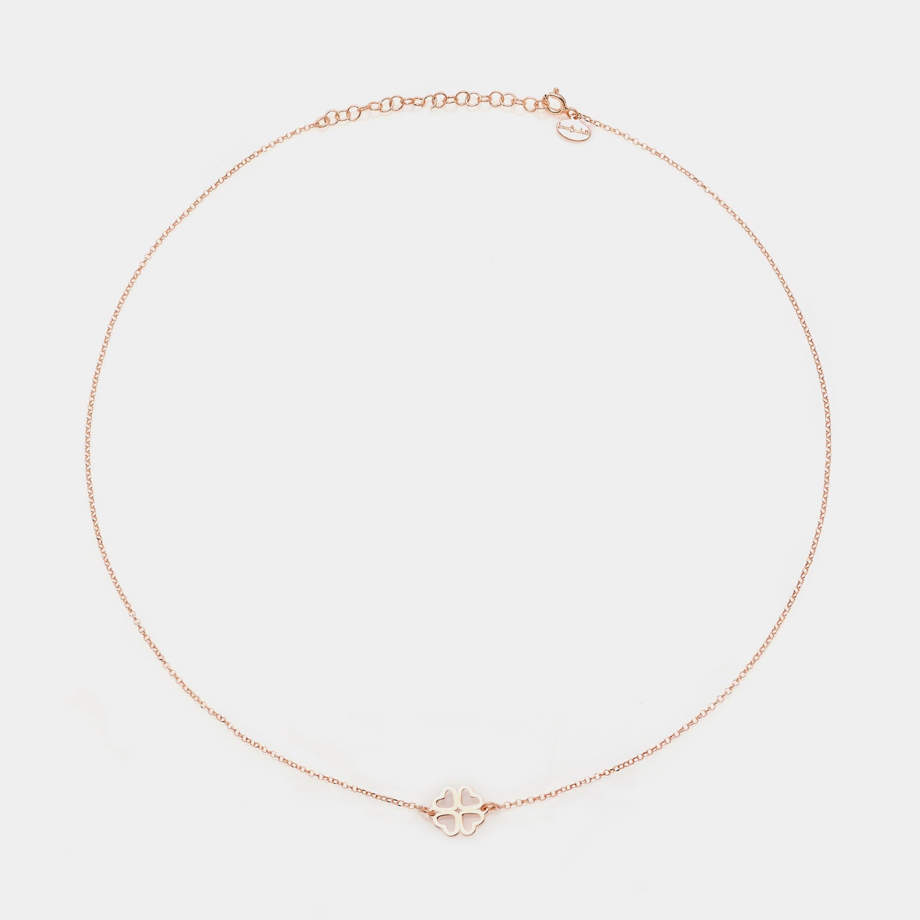 Rose gold silver necklace with clover centerpiece and heart-shaped cutout petals