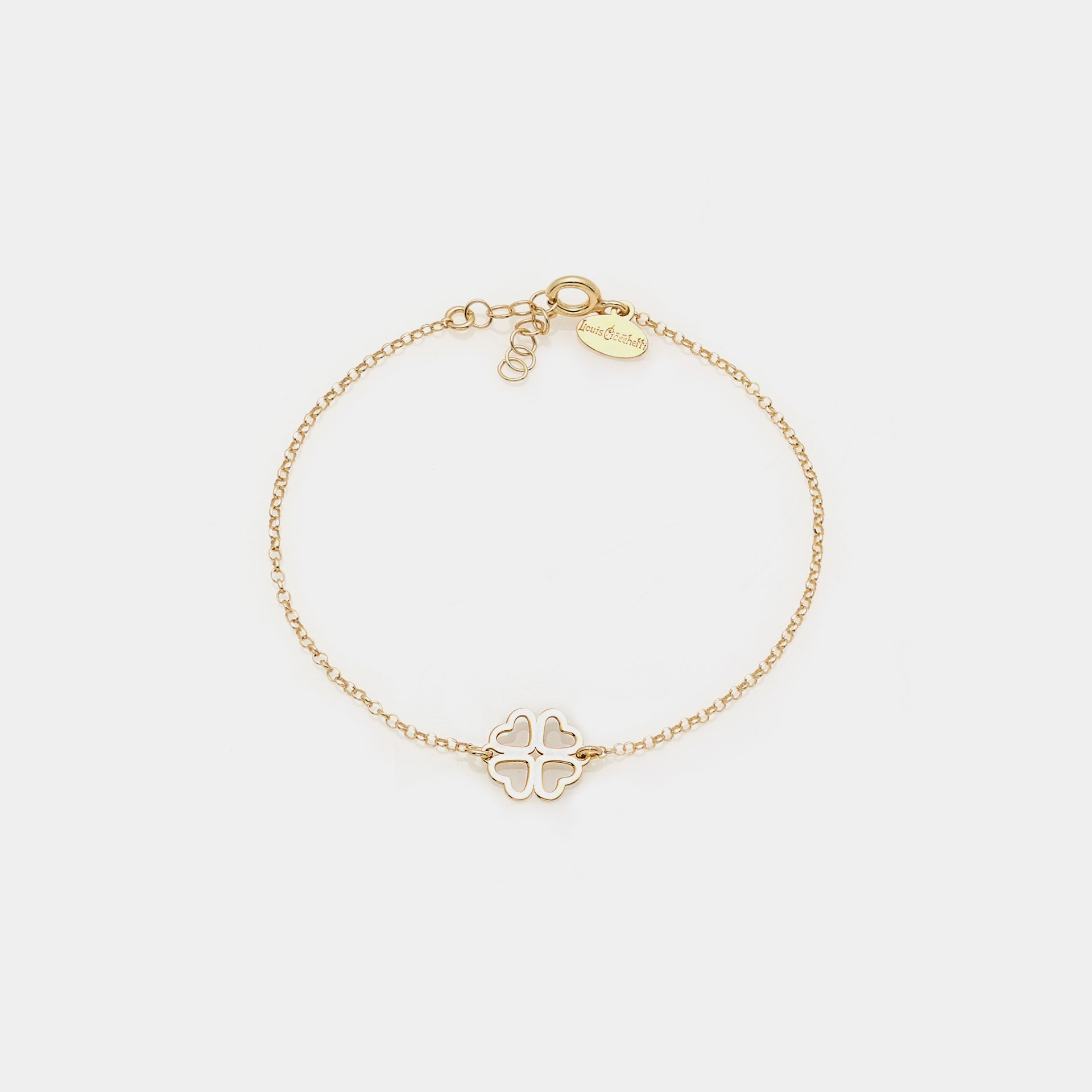 Gold-plated silver bracelet with clover centerpiece and heart-shaped perforated petals