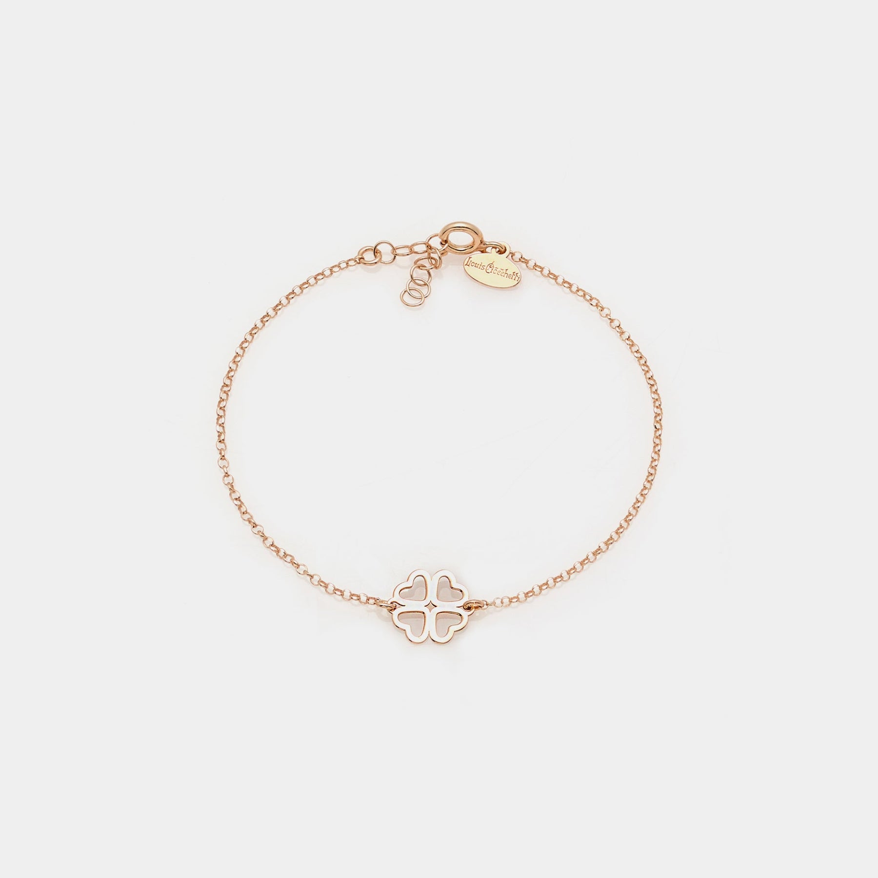 Rose gold plated silver bracelet with clover centerpiece and heart-shaped perforated petals