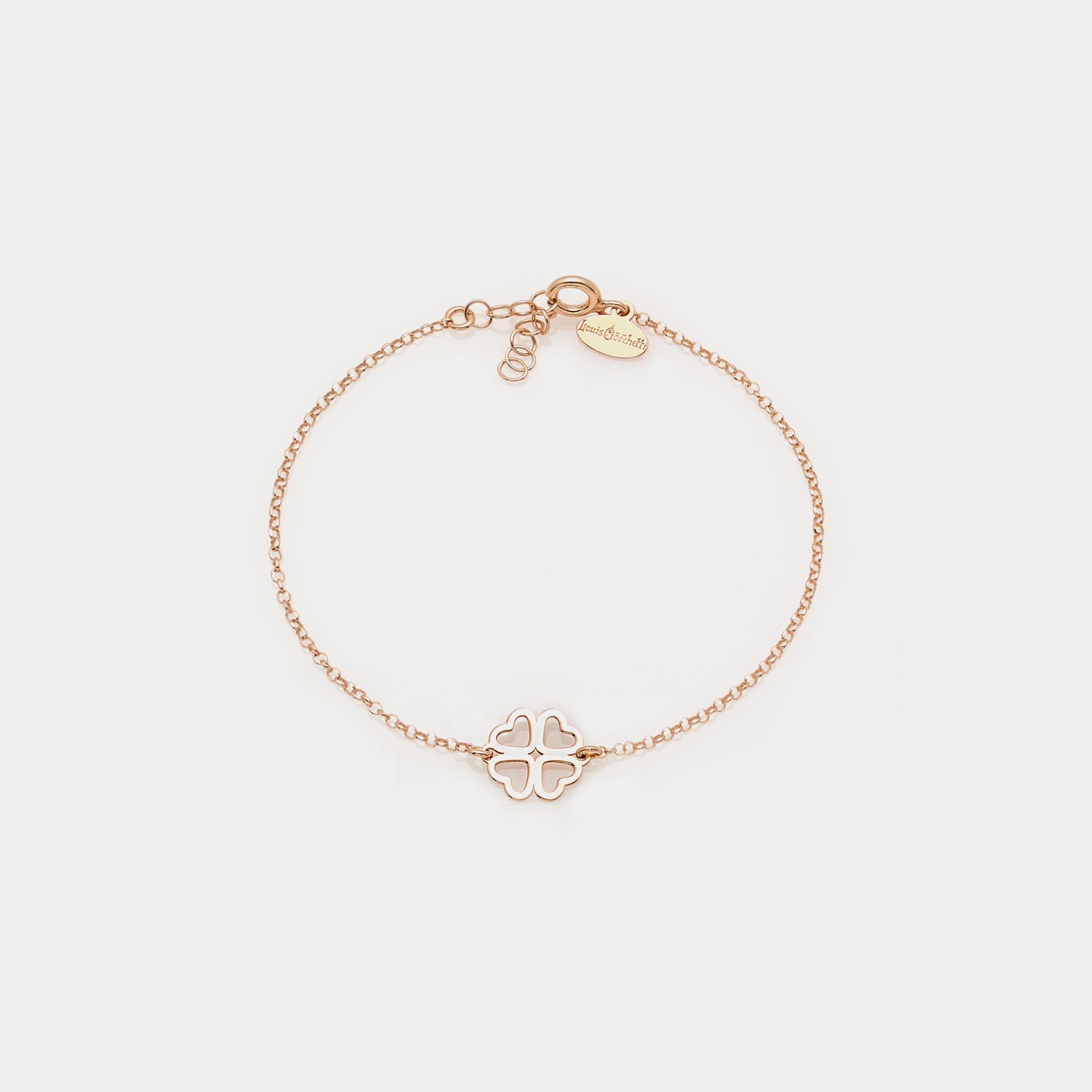 Rose gold plated silver bracelet with clover centerpiece and heart-shaped perforated petals