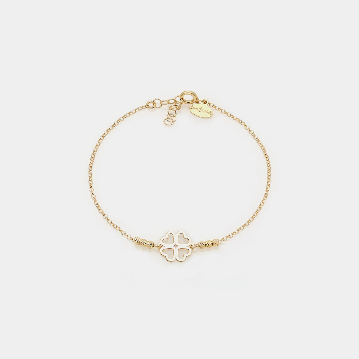 Gold-plated silver bracelet with faceted spheres and clover with heart-shaped central petals