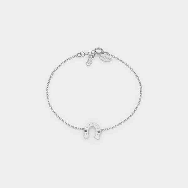 Rhodium-plated silver bracelet with horseshoe centerpiece