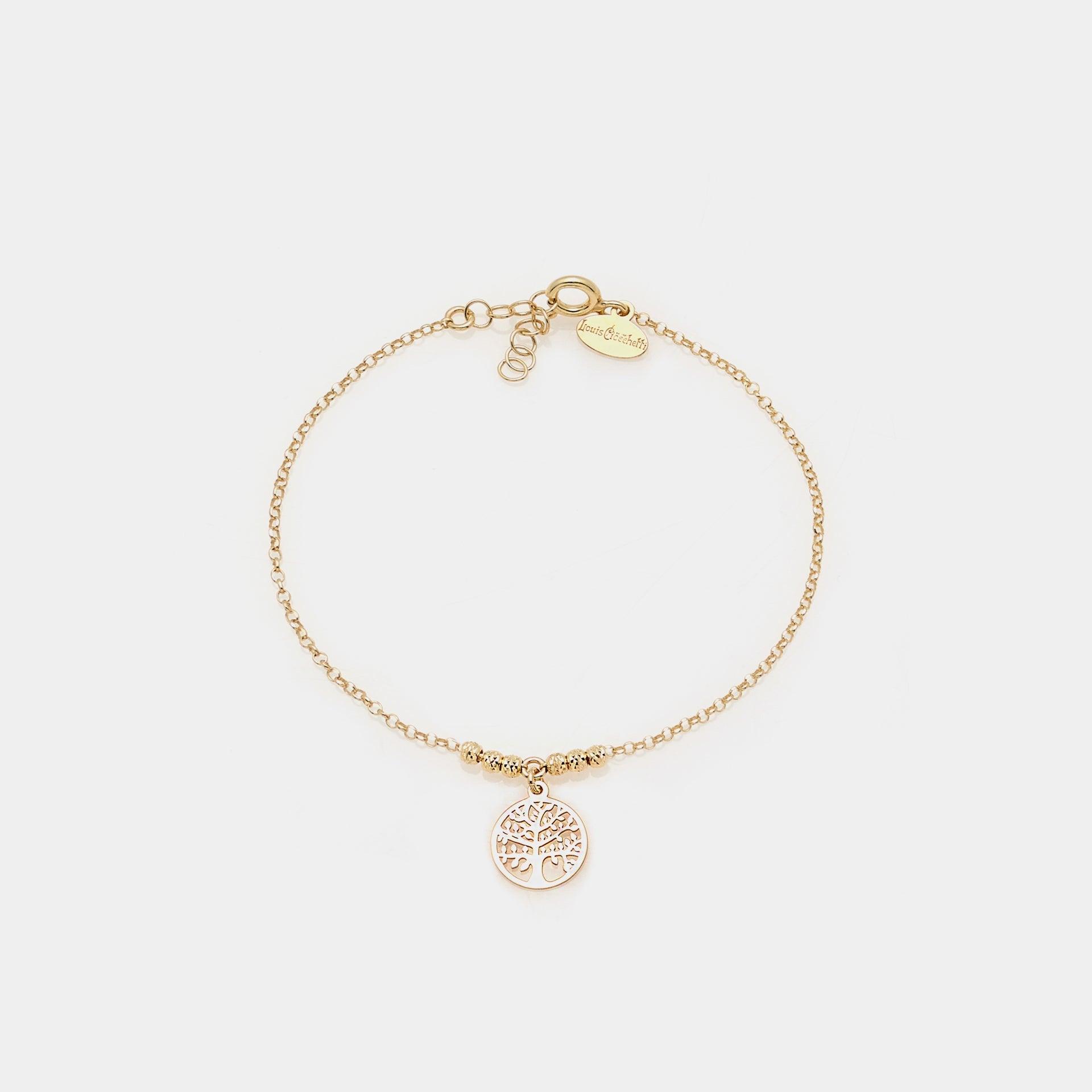 Gold-plated silver bracelet with faceted spheres and round cut-out tree of life central pendant