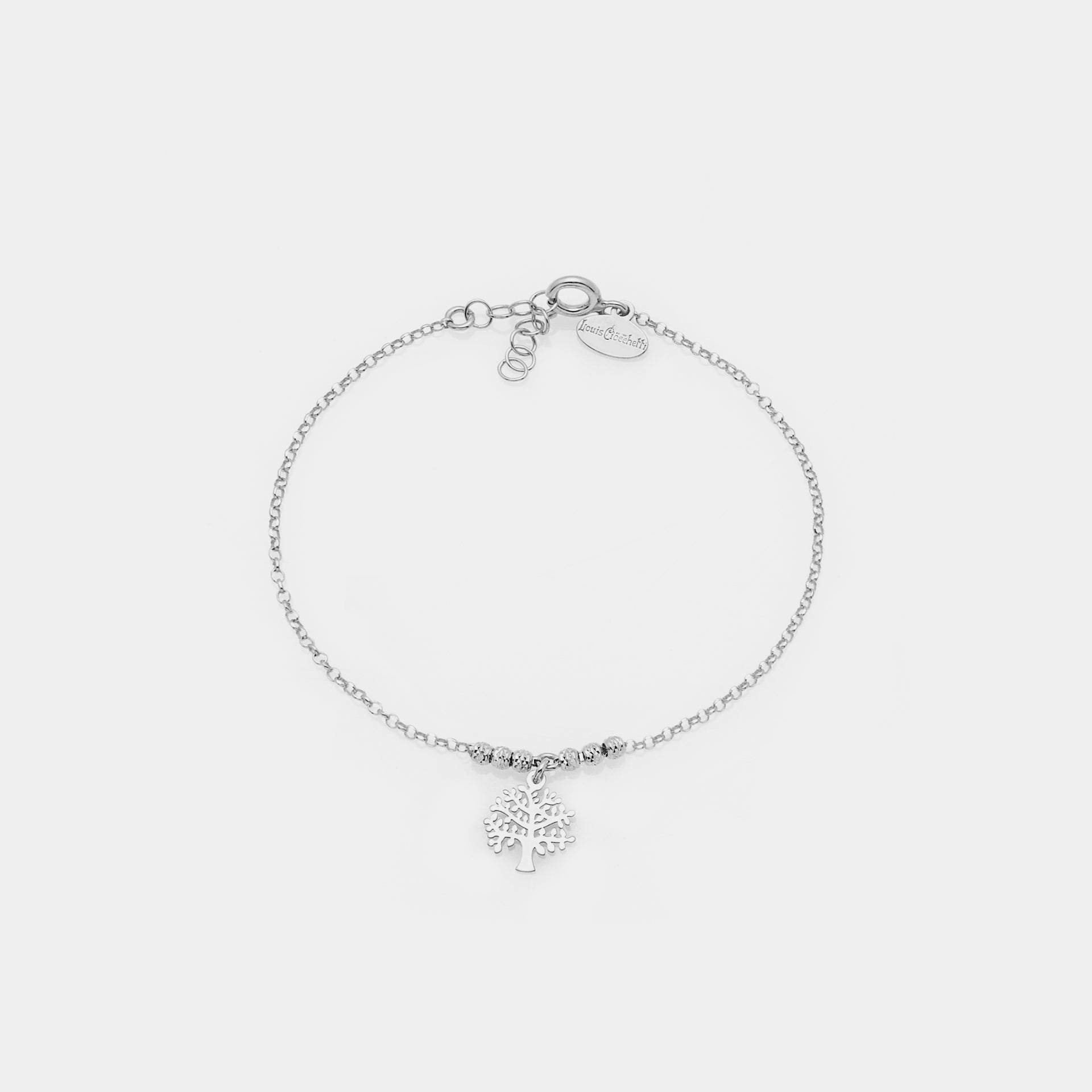 Rhodium-plated silver bracelet with faceted spheres and central pierced tree of life pendant
