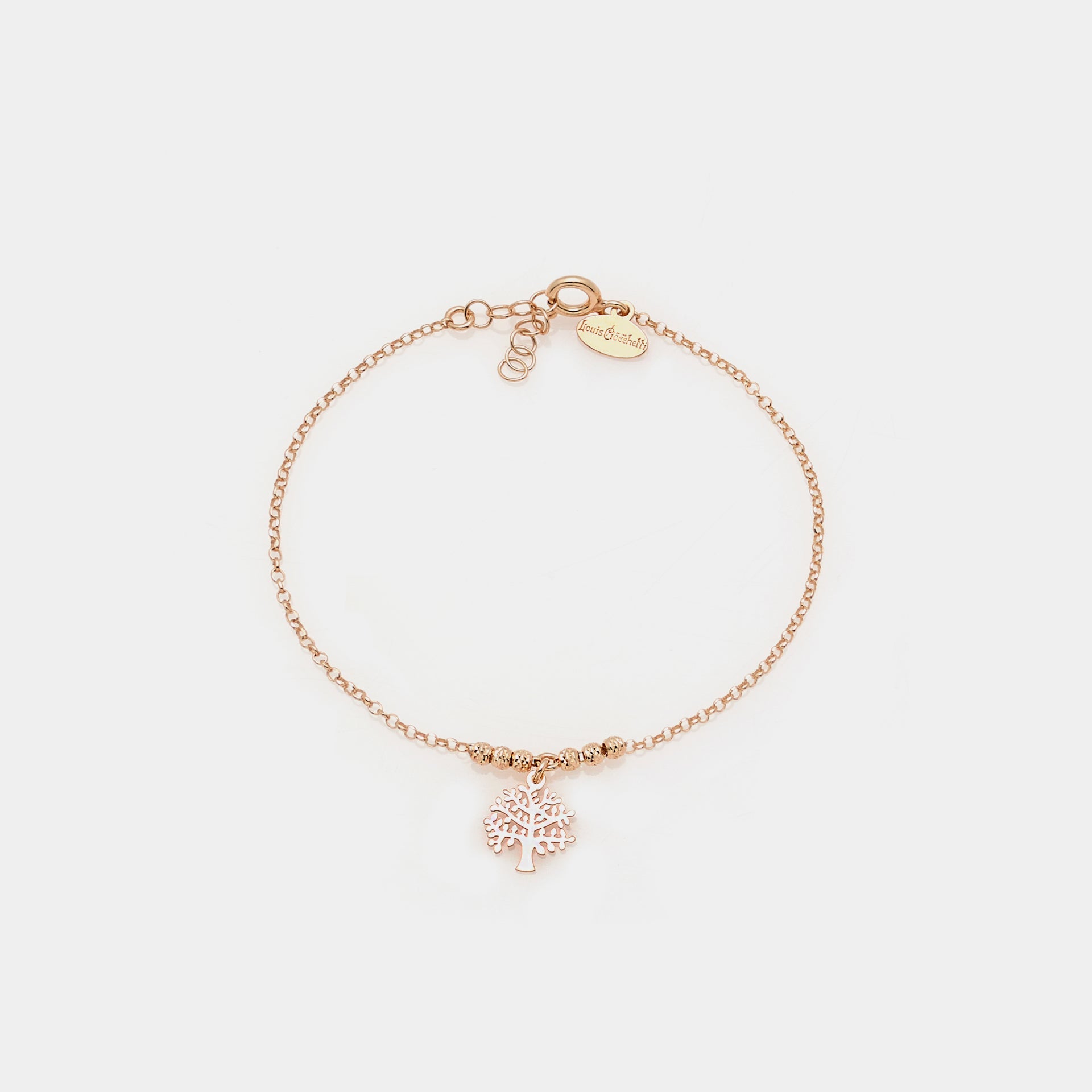 Rose gold plated silver bracelet with faceted spheres and central cut-out tree of life pendant