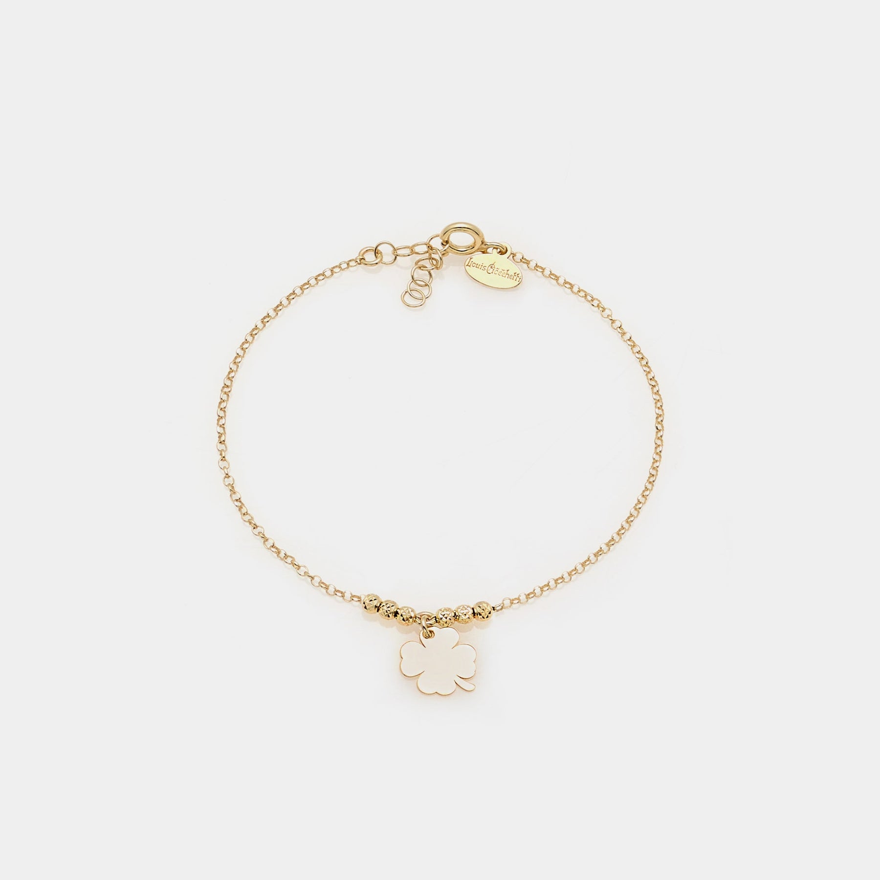 Gold-plated silver bracelet with faceted beads and central clover pendant