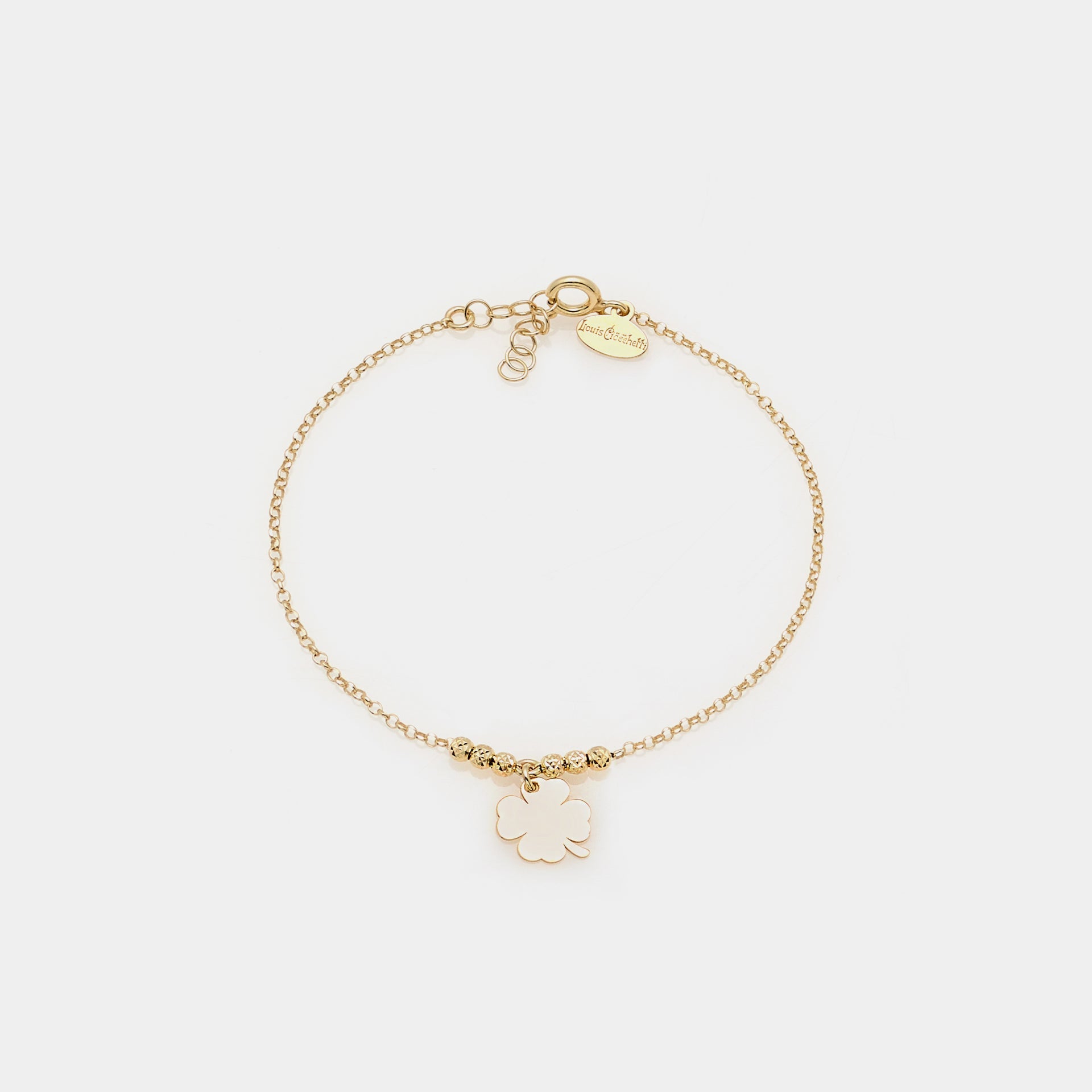 Gold-plated silver bracelet with faceted beads and central clover pendant