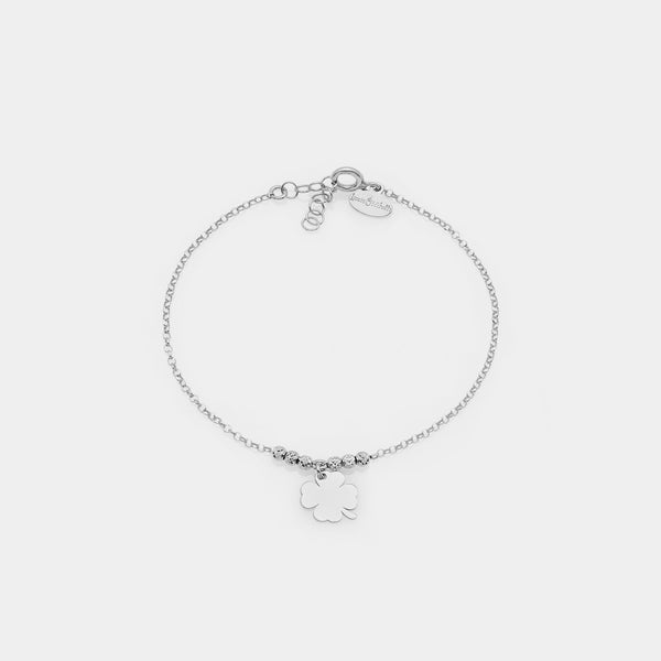 Rhodium-plated silver bracelet with faceted spheres and central hanging four-leaf clover