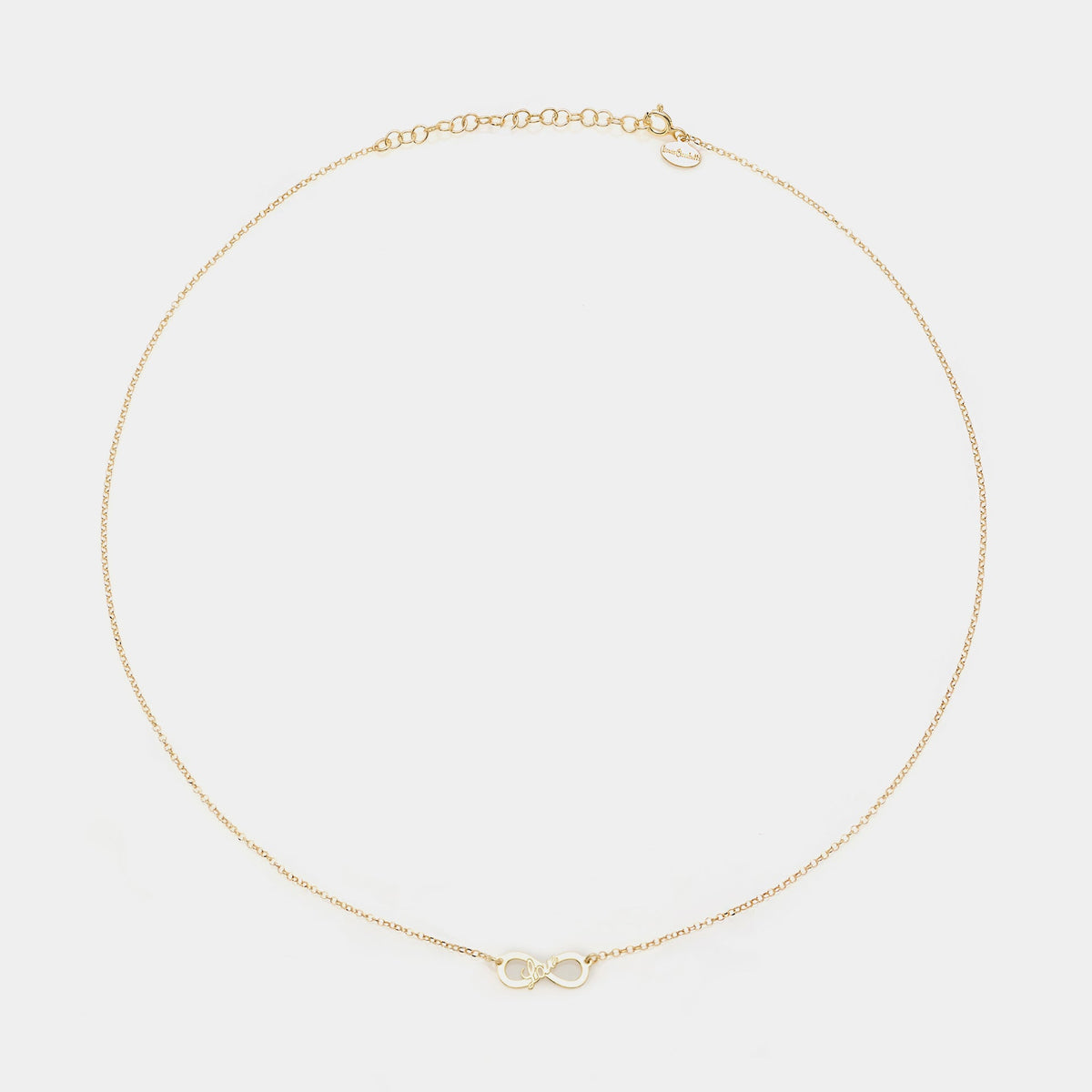 Collana argento dorato con centrale infinito traforato e scritta LOVE