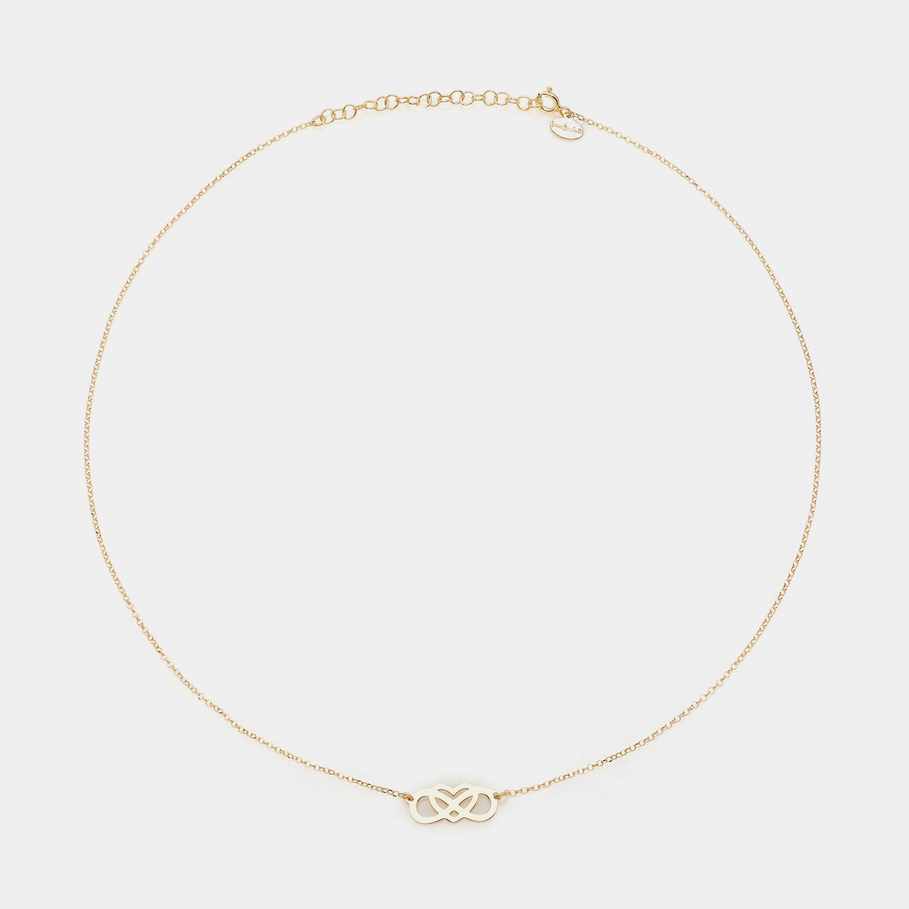Gold-plated silver necklace with intertwined and perforated infinity center and heart