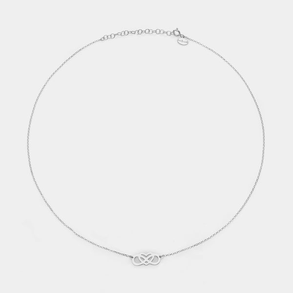 Collar de plata chapada en rodio con centro de infinito entrelazado y perforado y corazón