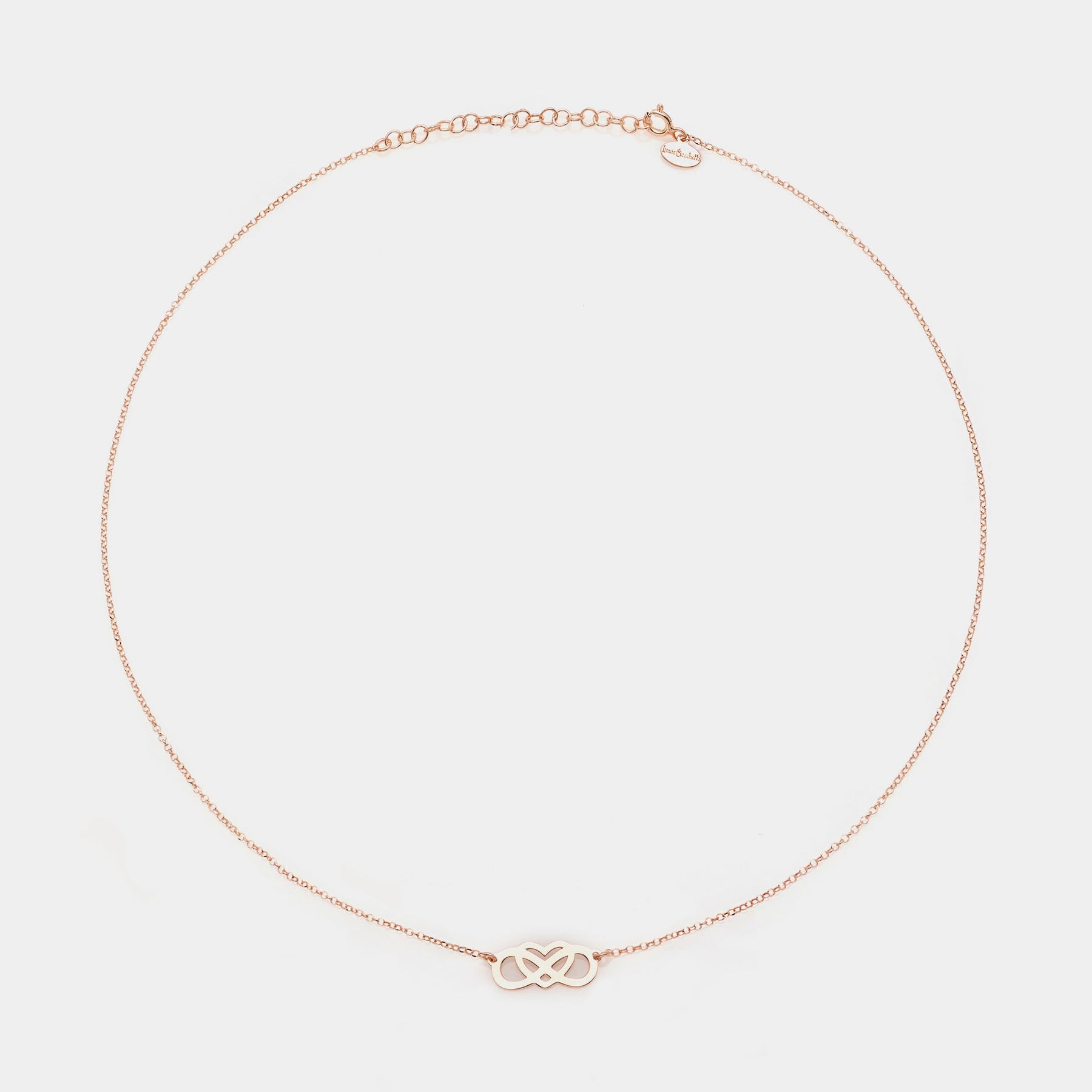 Rose gold silver necklace with intertwined and perforated infinity center and heart