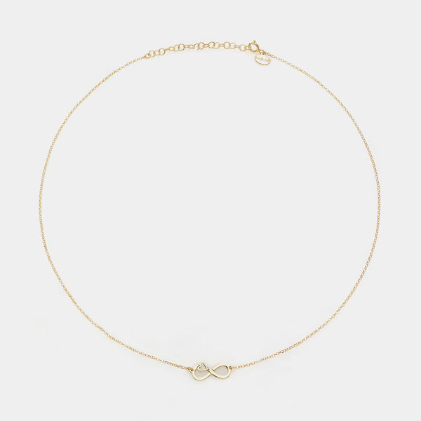 Collana argento dorato con centrale infinito traforato e cuore laterale