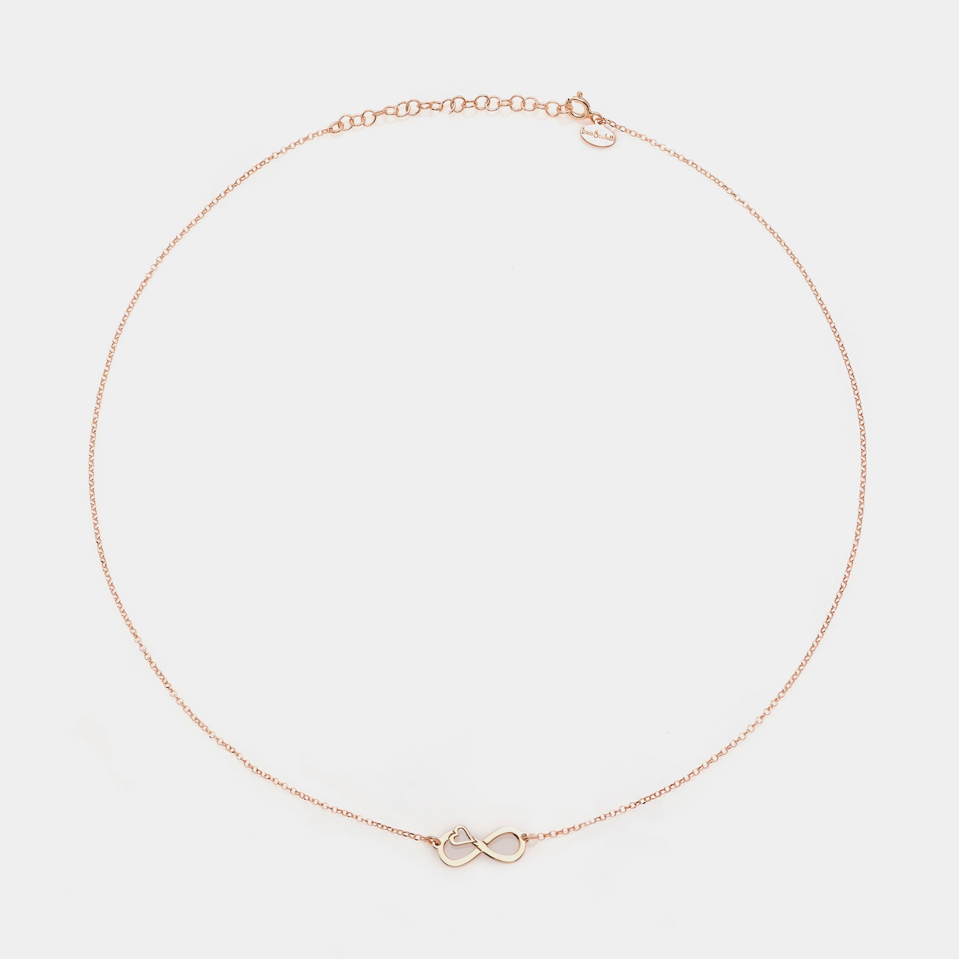 Rose gold silver necklace with pierced infinity center and side heart