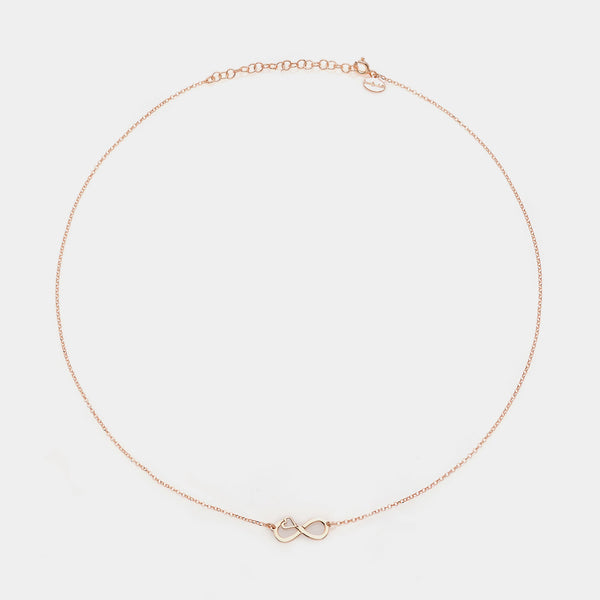 Collana argento rosato con centrale infinito traforato e cuore laterale
