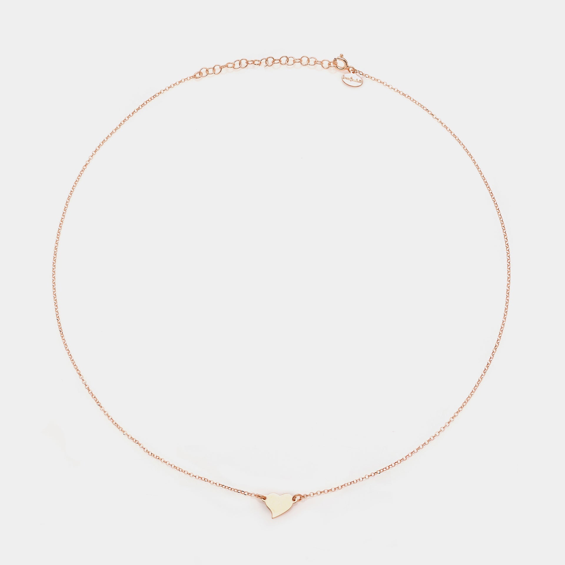 Rose gold silver necklace with twisted heart centerpiece