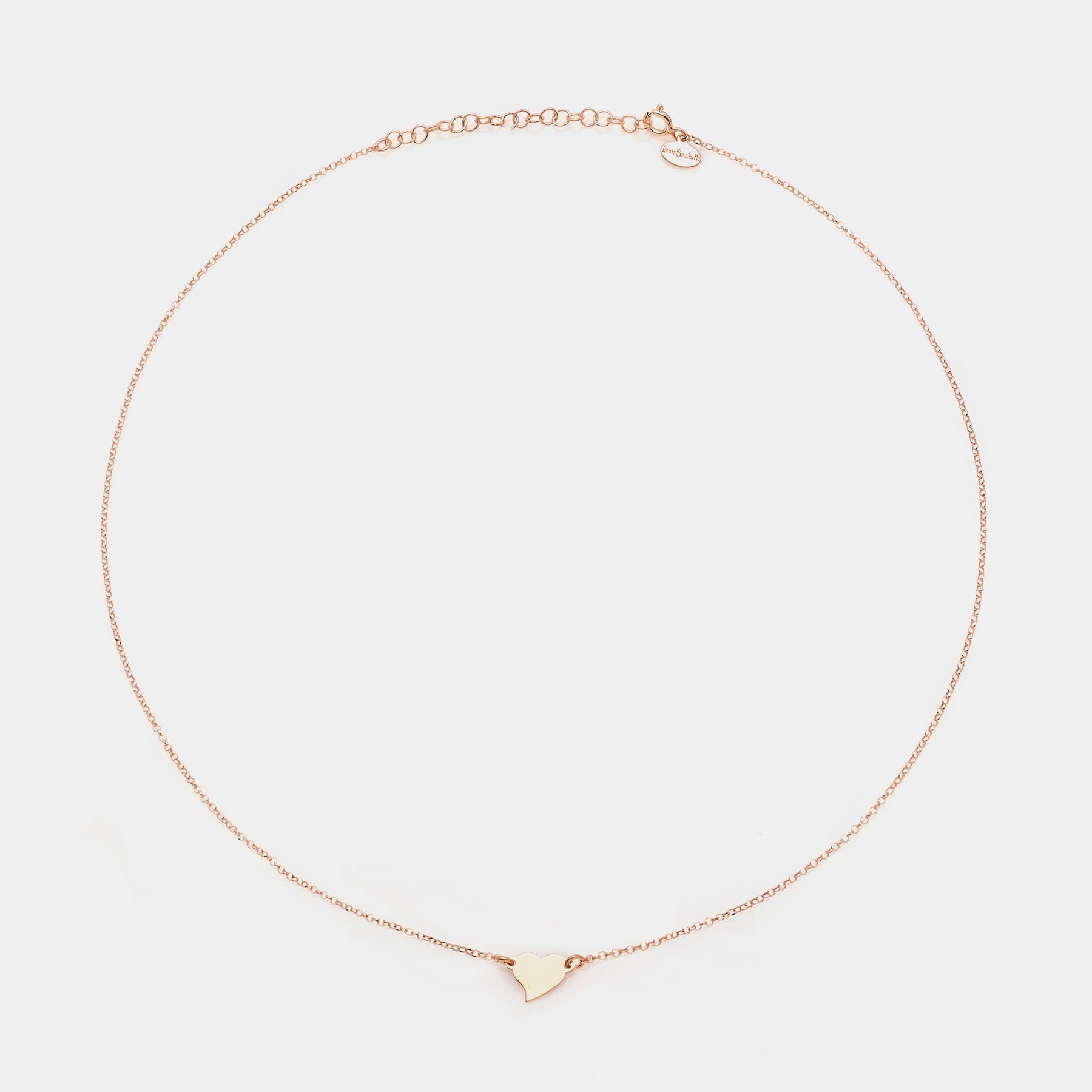 Rose gold silver necklace with twisted heart centerpiece