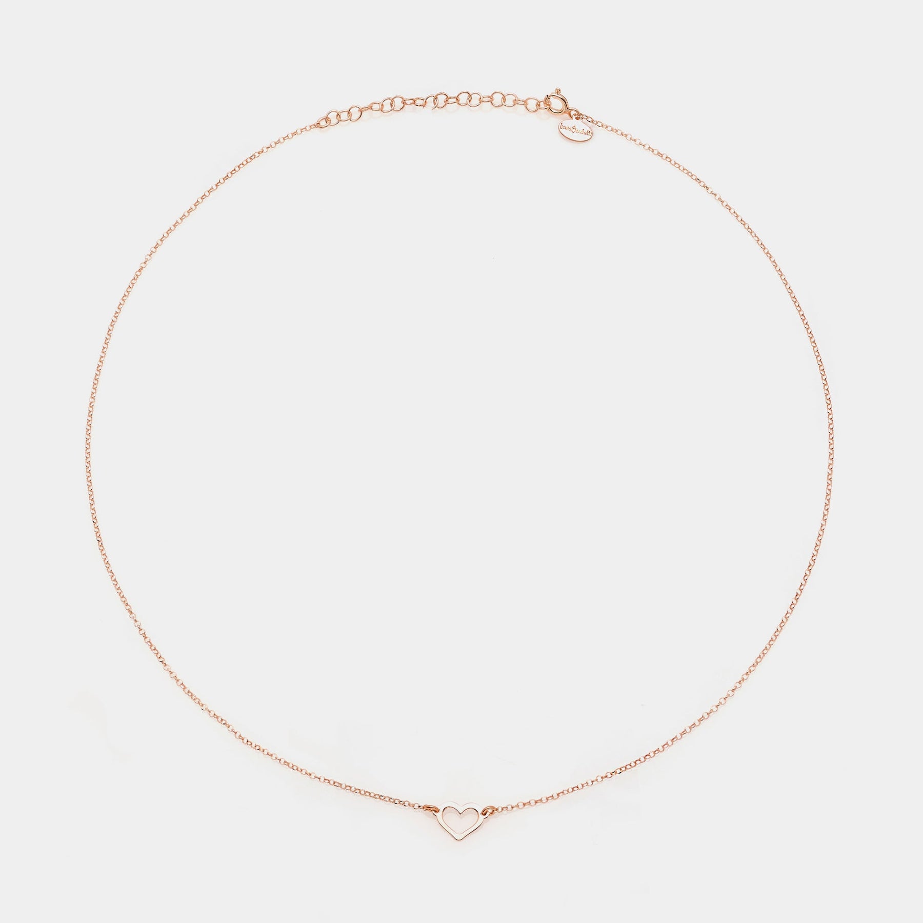Rose gold silver necklace with classic pierced heart centerpiece