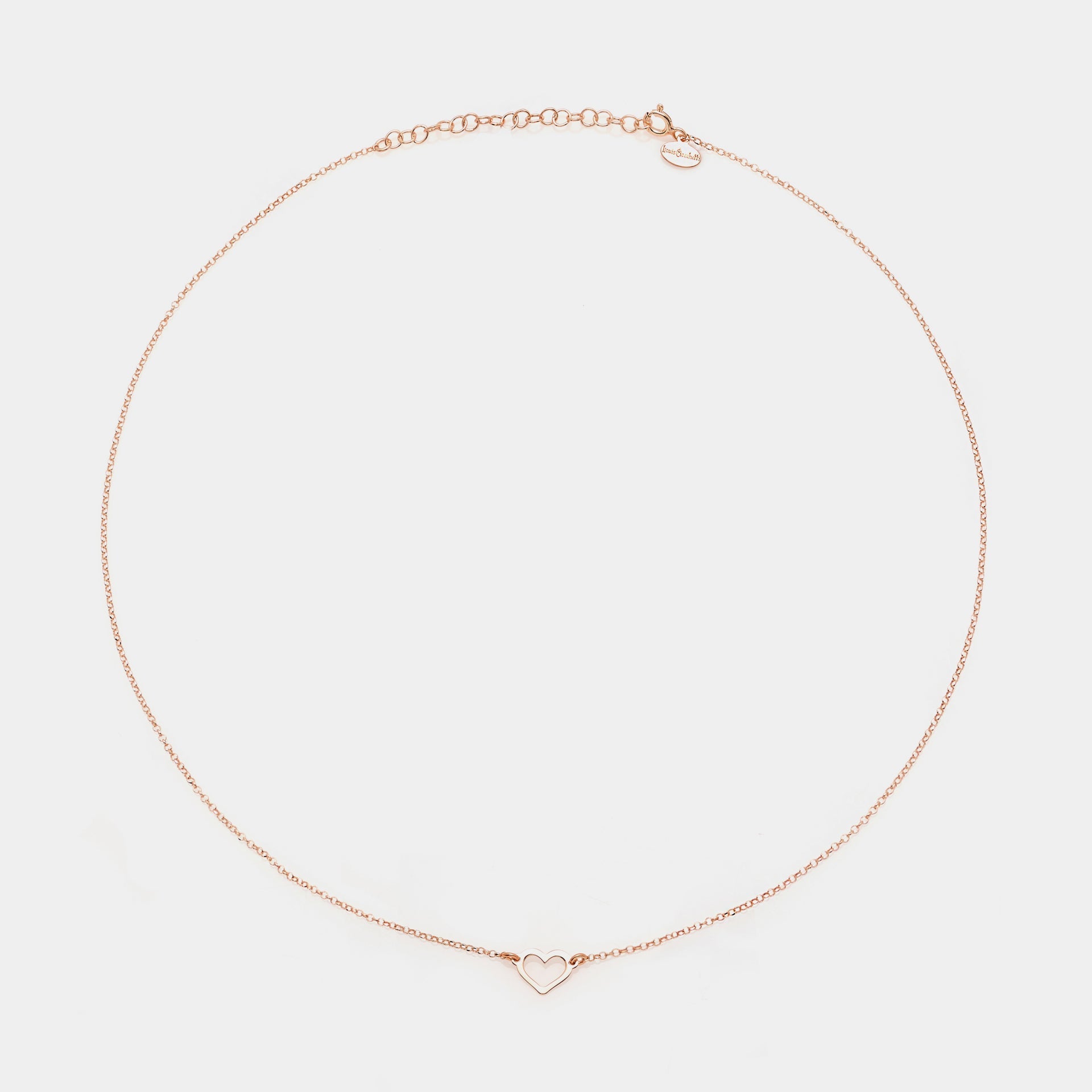 Rose gold silver necklace with classic pierced heart centerpiece