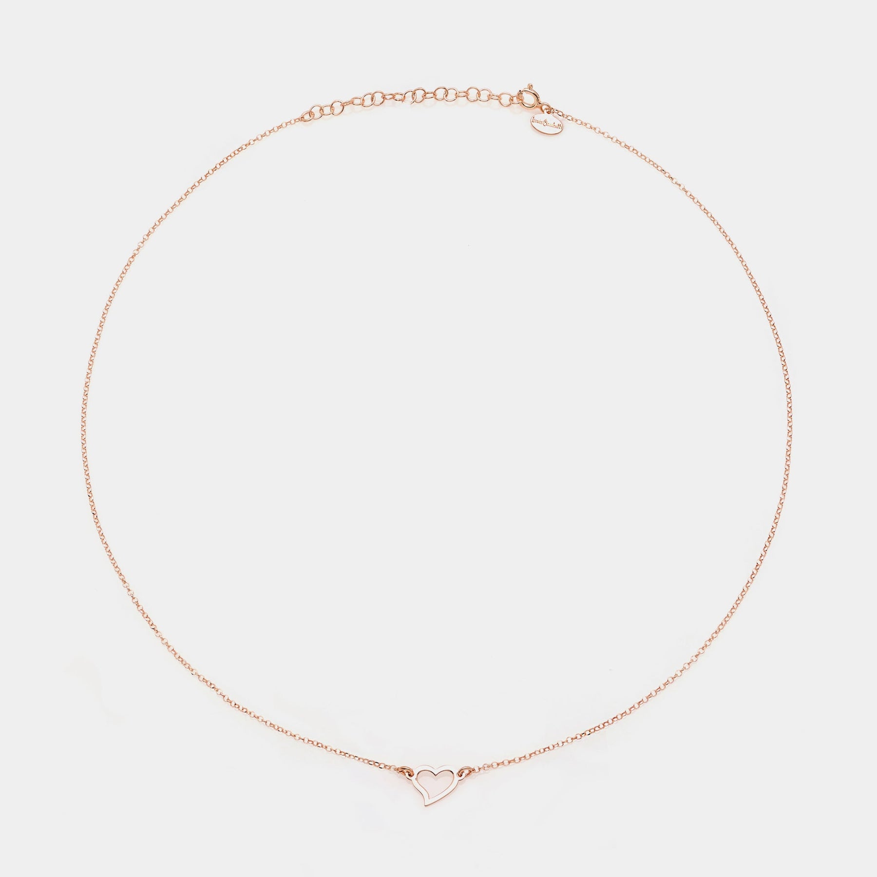Rose gold silver necklace with twisted heart centerpiece