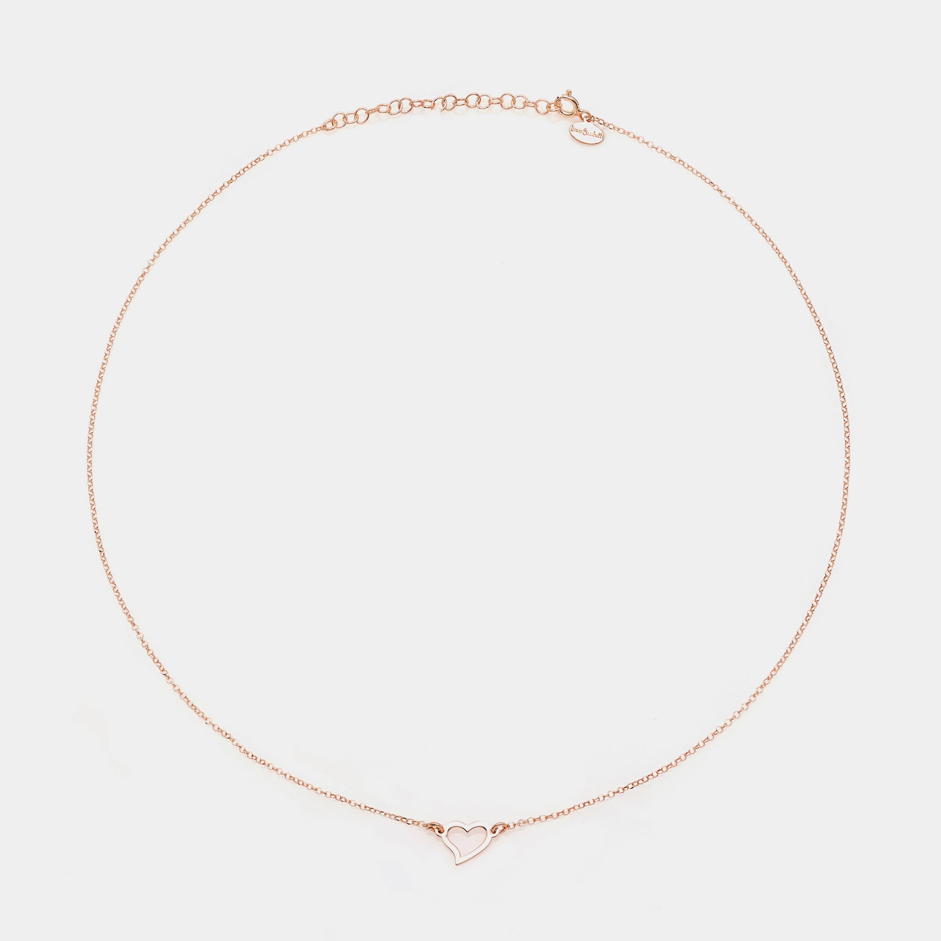 Rose gold silver necklace with twisted heart centerpiece