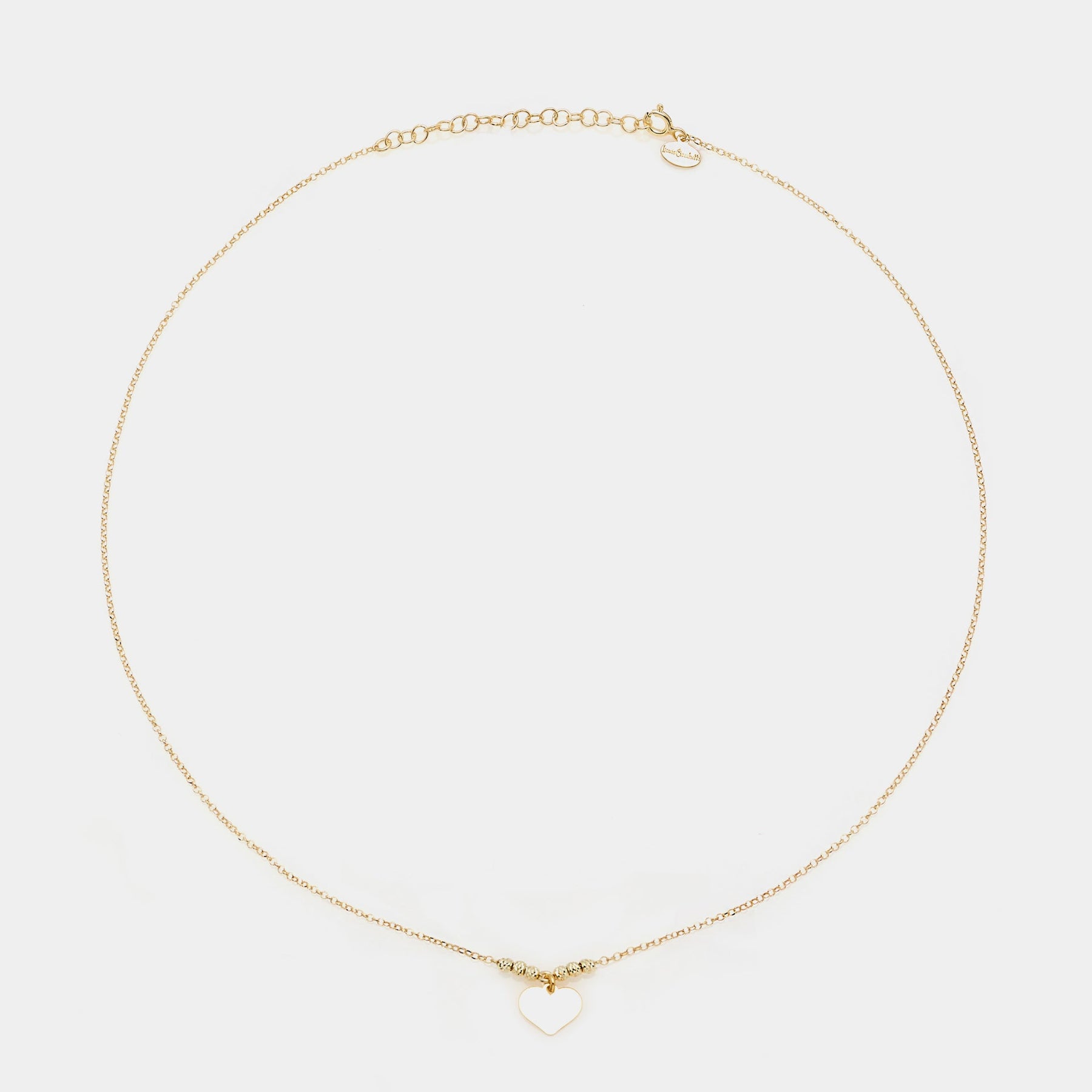 Gold-plated silver necklace with classic heart pendant and faceted spheres on the sides