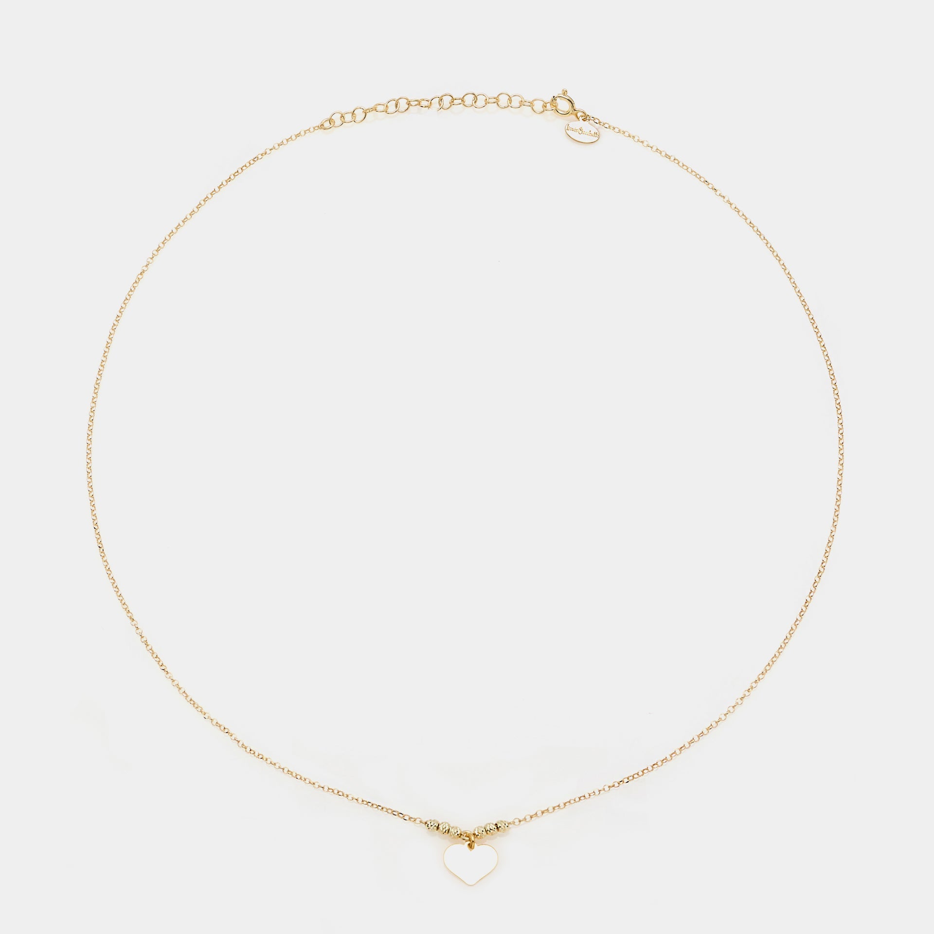 Gold-plated silver necklace with classic heart pendant and faceted spheres on the sides
