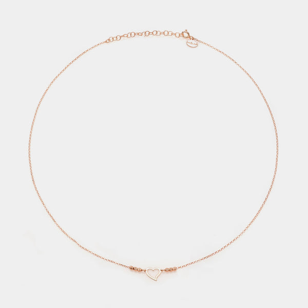 Rose gold silver necklace with twisted heart centerpiece and 3 faceted spheres on the sides