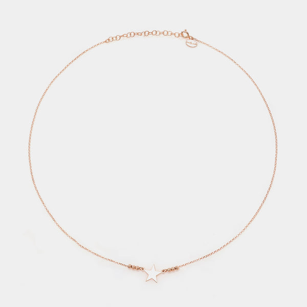 Rose gold silver necklace with star centerpiece and 3 faceted spheres on the sides