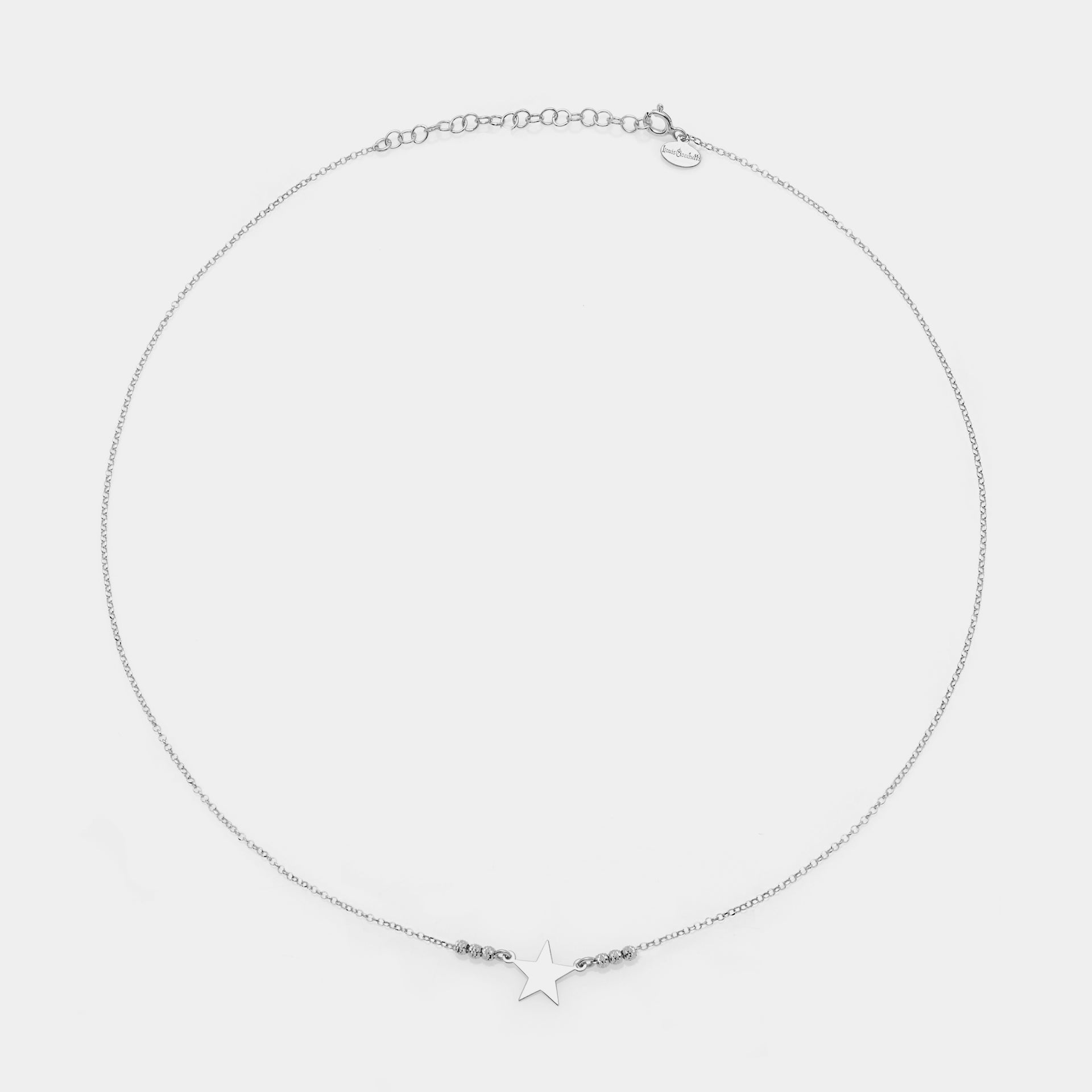 Rhodium-plated silver necklace with star centerpiece and 3 faceted spheres on the sides
