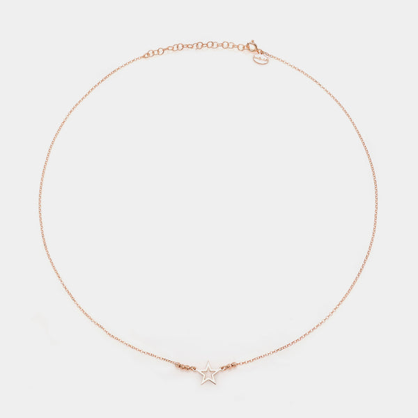 Rose gold silver necklace with pierced star centerpiece and 3 faceted spheres on the sides