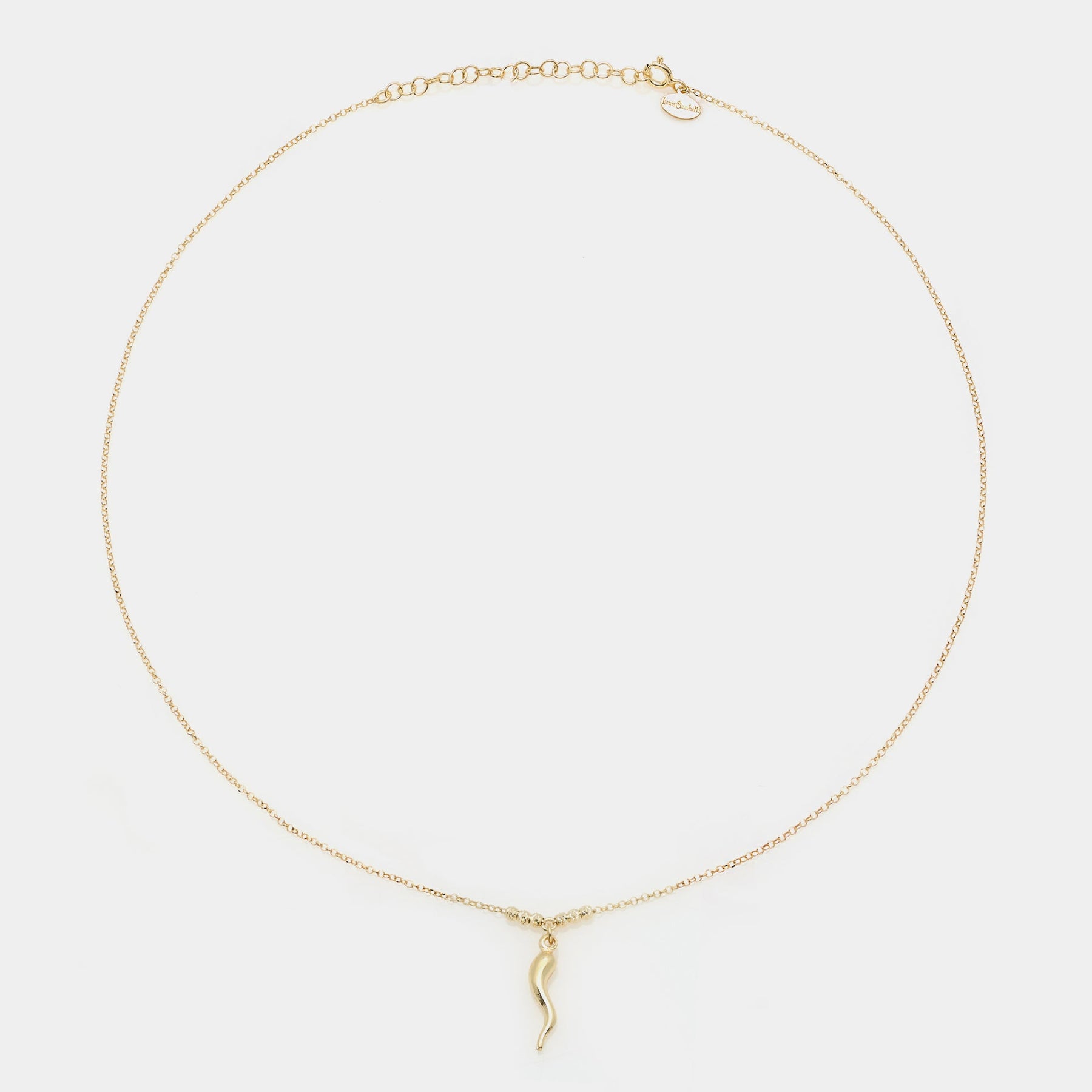 Gold-plated silver necklace with a smooth horn pendant and 3 faceted spheres on the sides