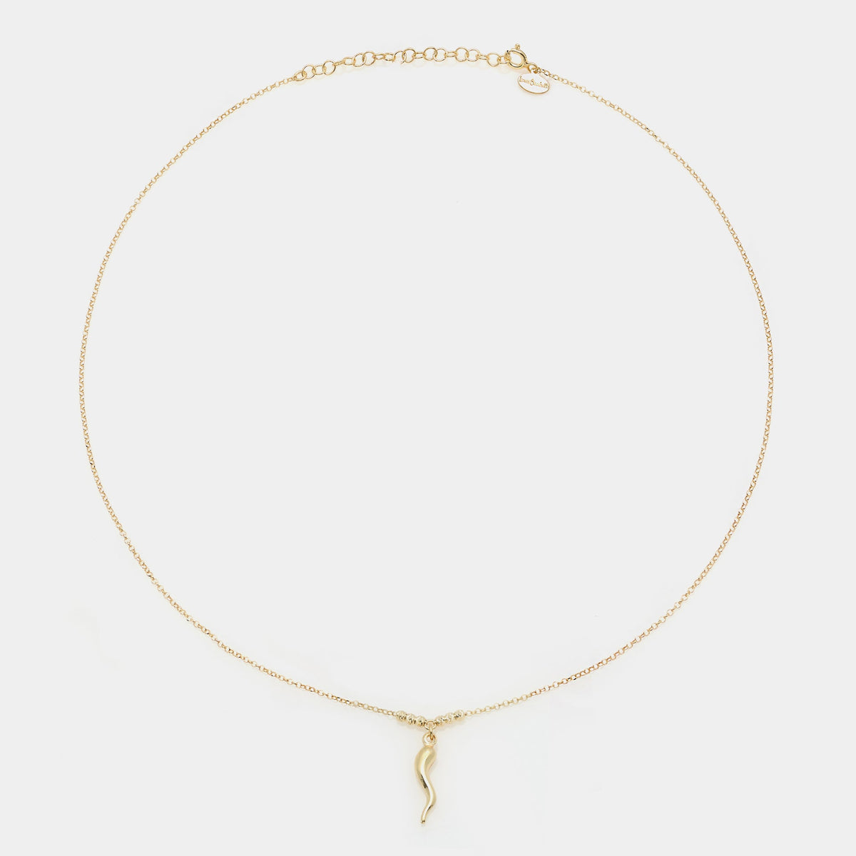 Gold-plated silver necklace with a smooth horn pendant and 3 faceted spheres on the sides
