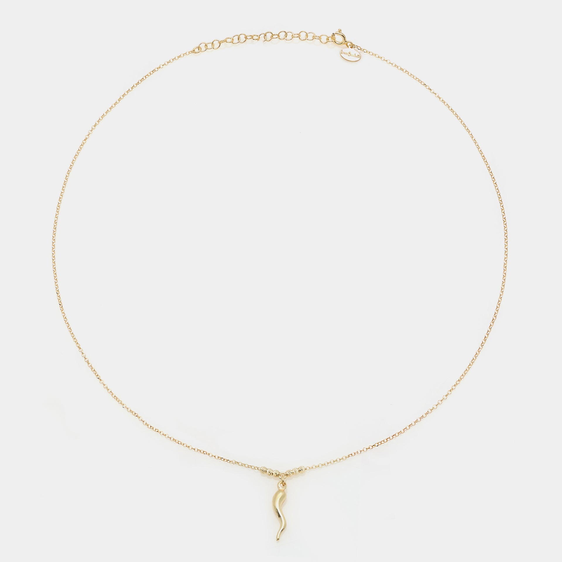 Gold-plated silver necklace with a smooth horn pendant and 3 faceted spheres on the sides