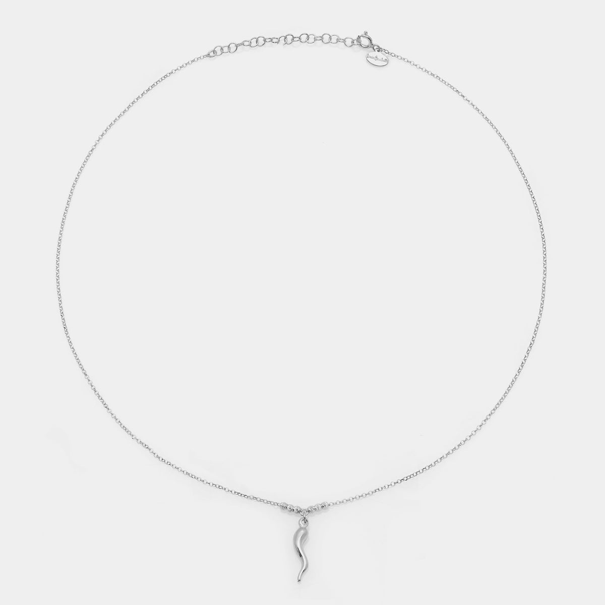 Rhodium-plated silver necklace with a central pendant of curved horn and 3 faceted spheres on the sides