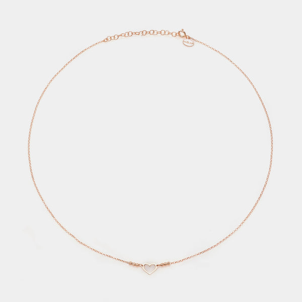 Rose gold silver necklace with simple pierced heart centerpiece and 3 faceted spheres on the sides