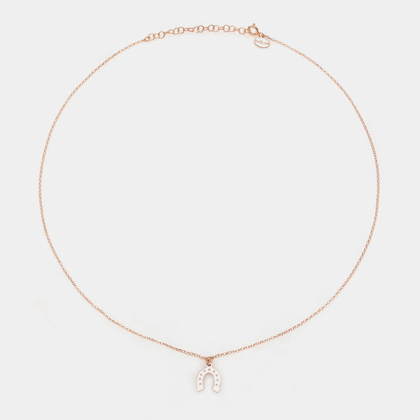 Rose gold silver necklace with hanging horseshoe centerpiece