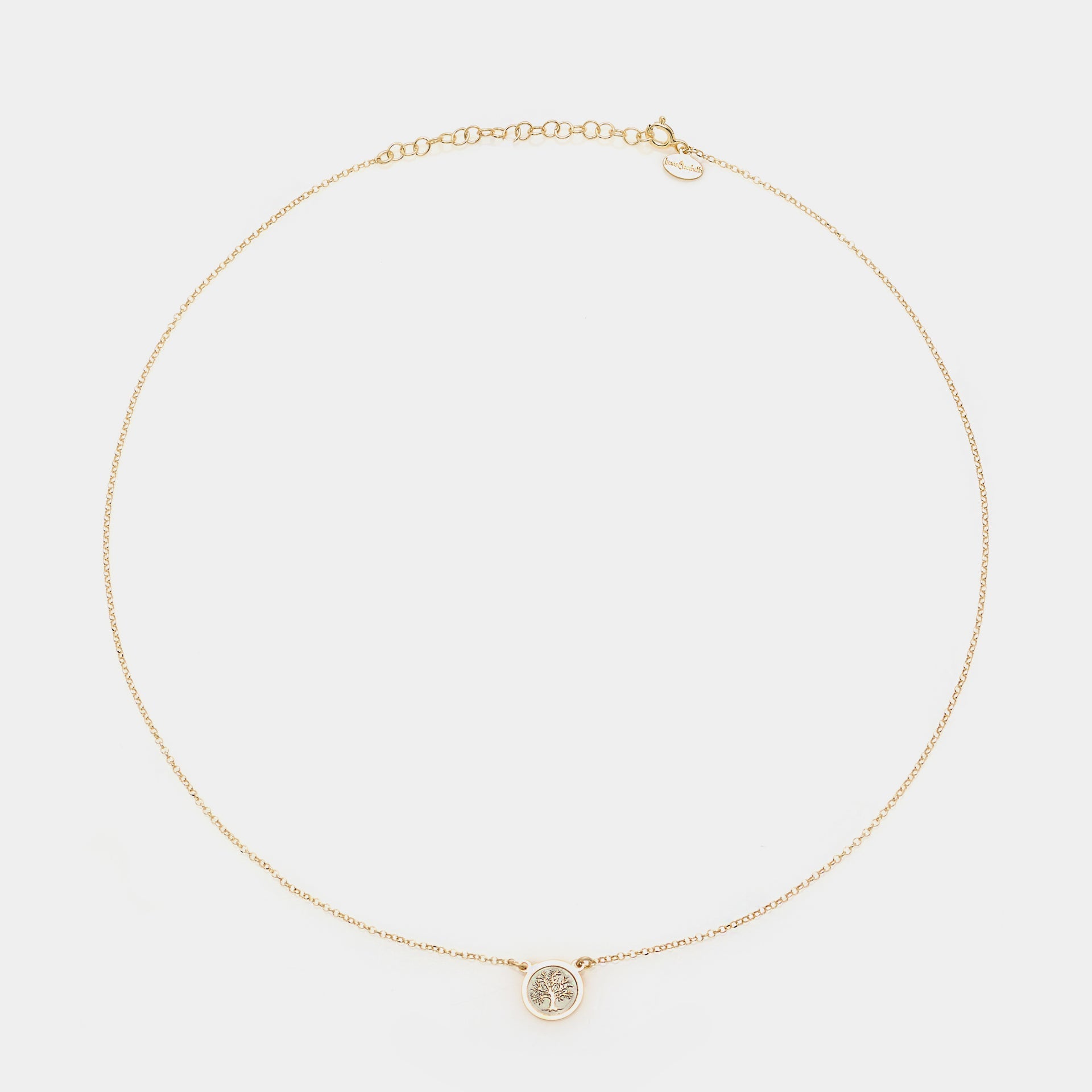 Gold-plated silver necklace with central disc featuring the tree of life
